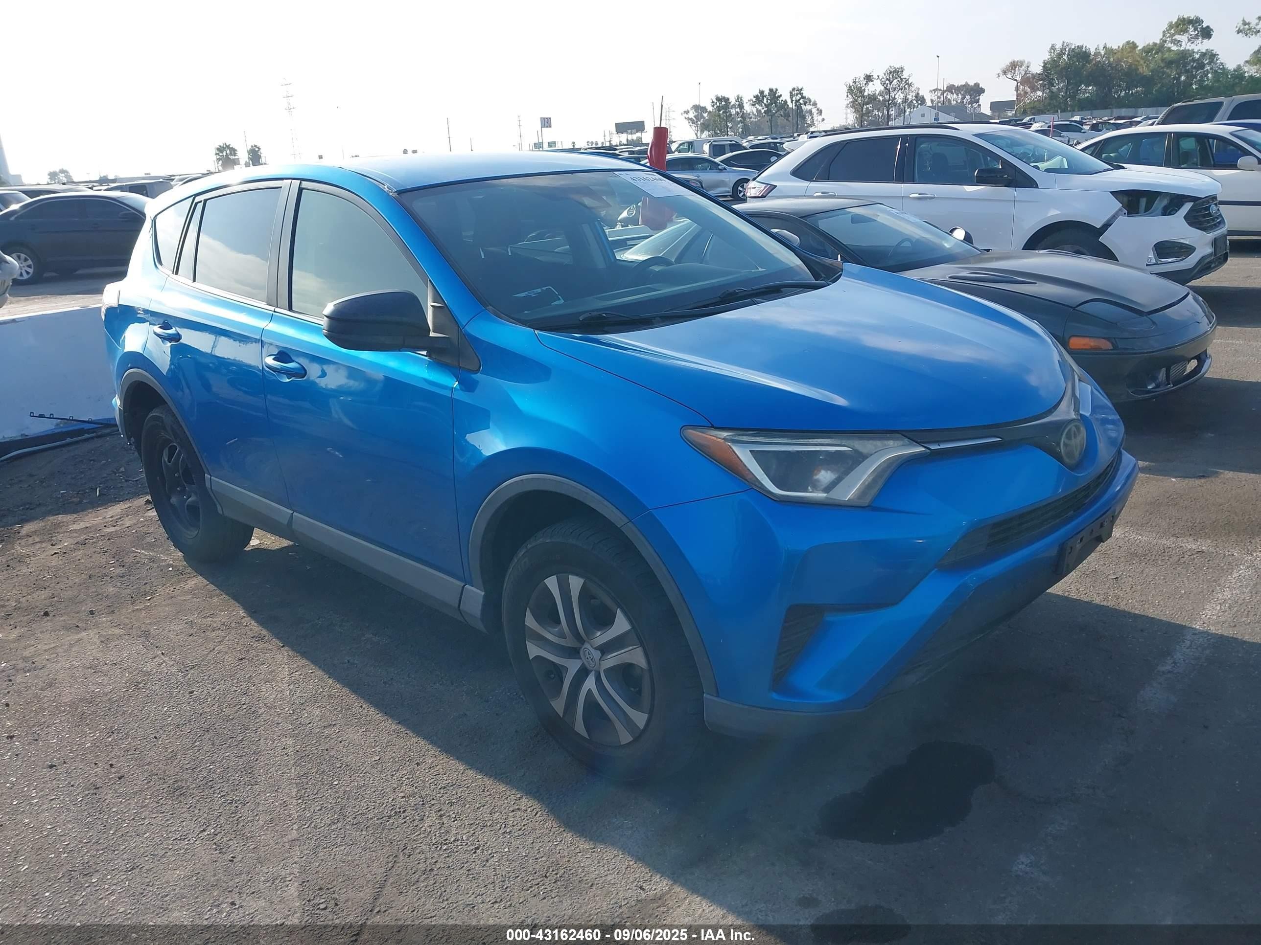 2017 Toyota RAV4 LE, VIN 2T3ZFREV6HW396389 — Rear end