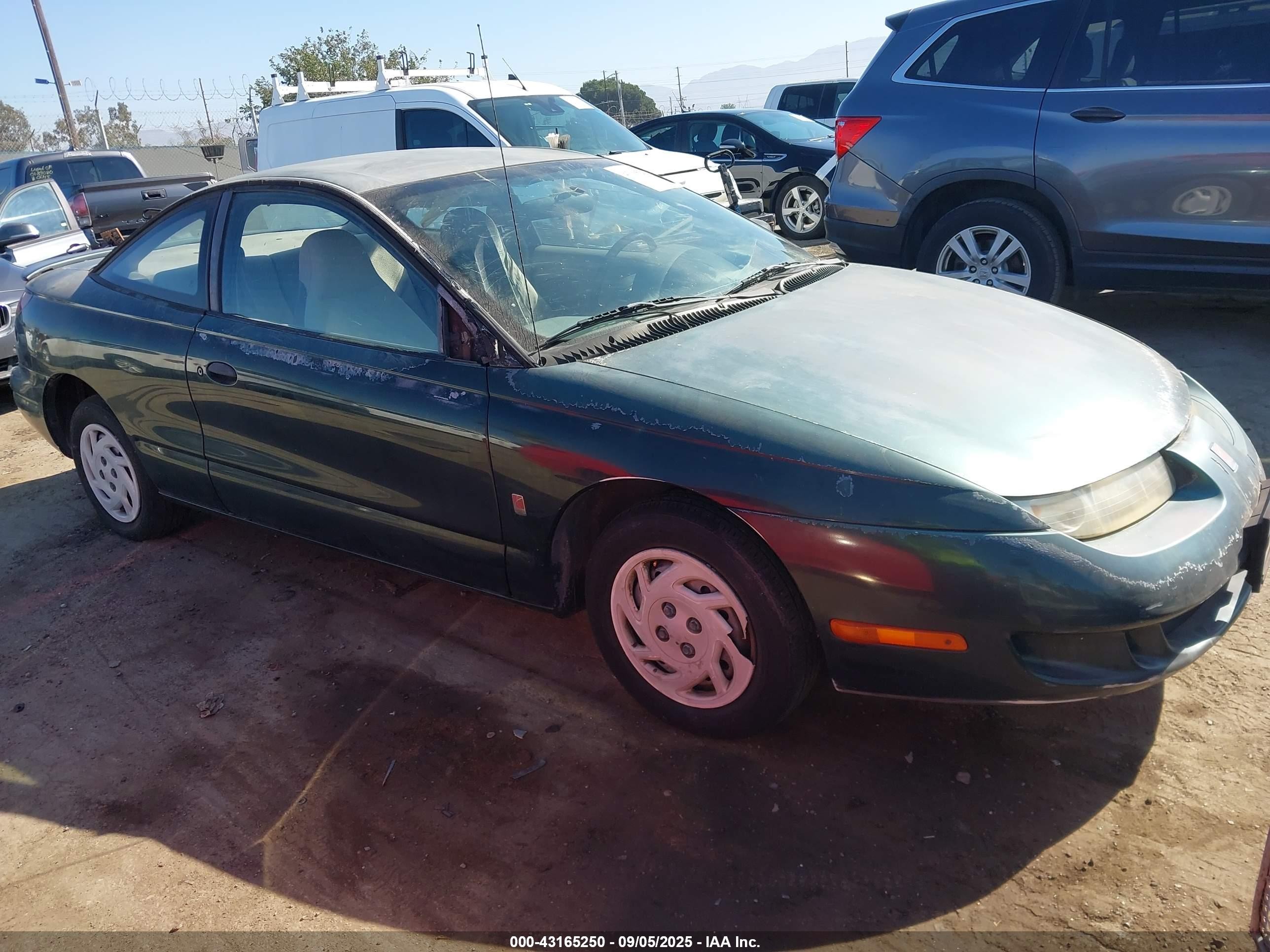 1997 Saturn SC, VIN 1G8ZF1282VZ200938 — Rear end