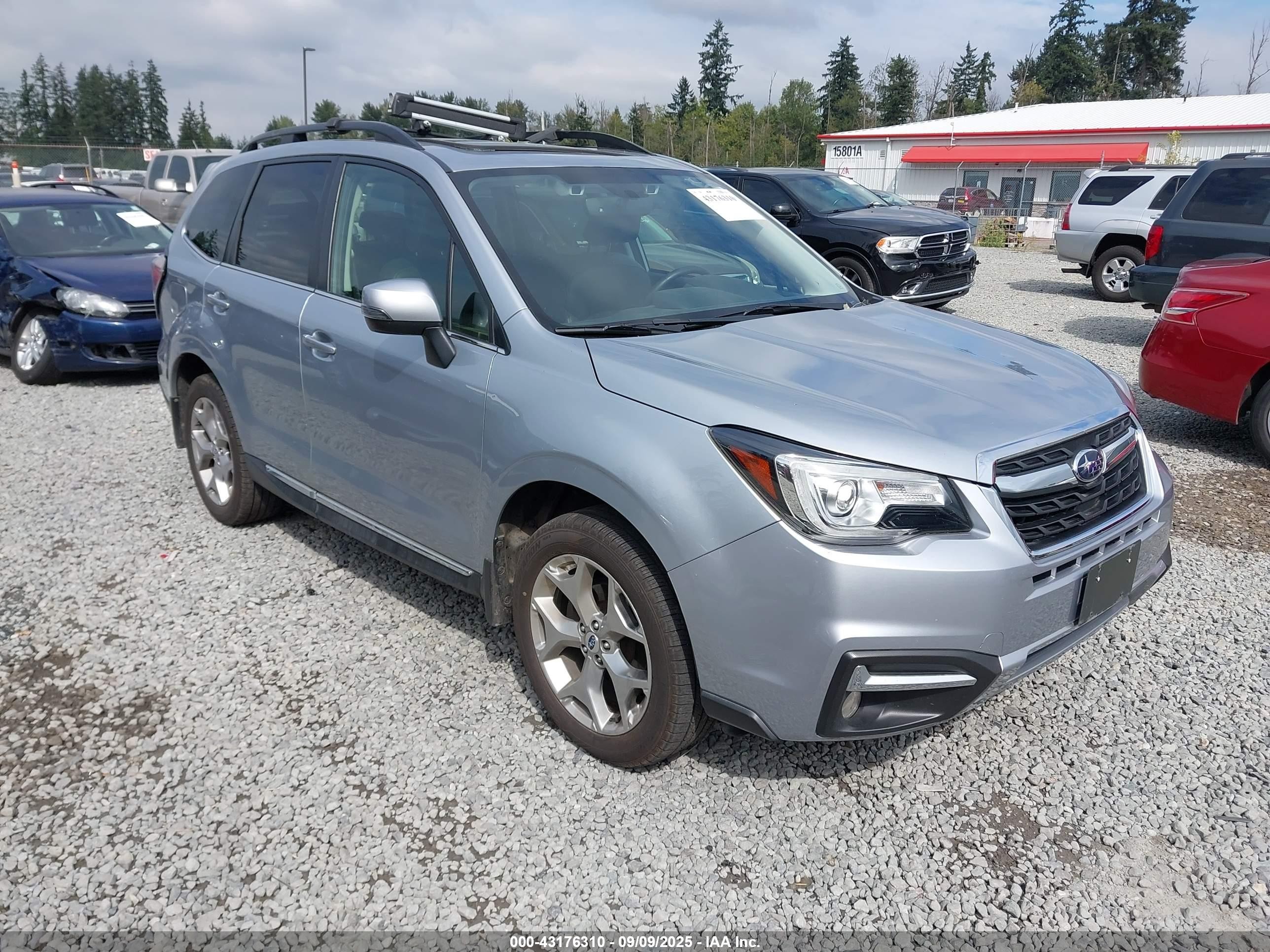 2018 Subaru Forester Touring, VIN JF2SJAWC0JH500824 — Storm