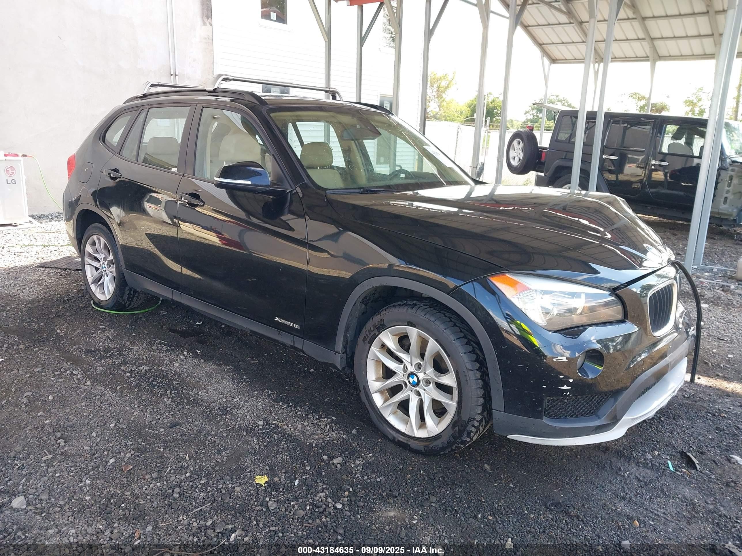 2015 BMW X1 xDrive28i, VIN WBAVL1C51FVY34930 — Front end