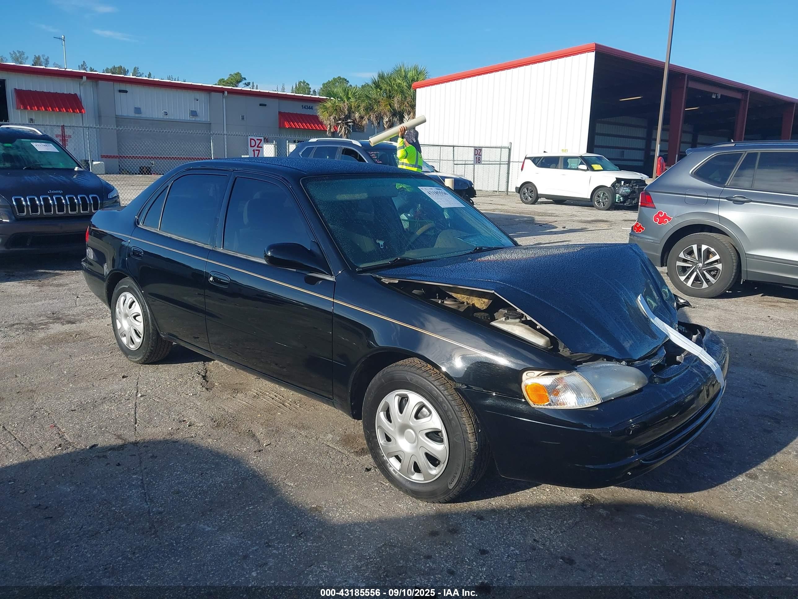 1998 Toyota Corolla CE, VIN 1NXBR12E0WZ100061 — Front end