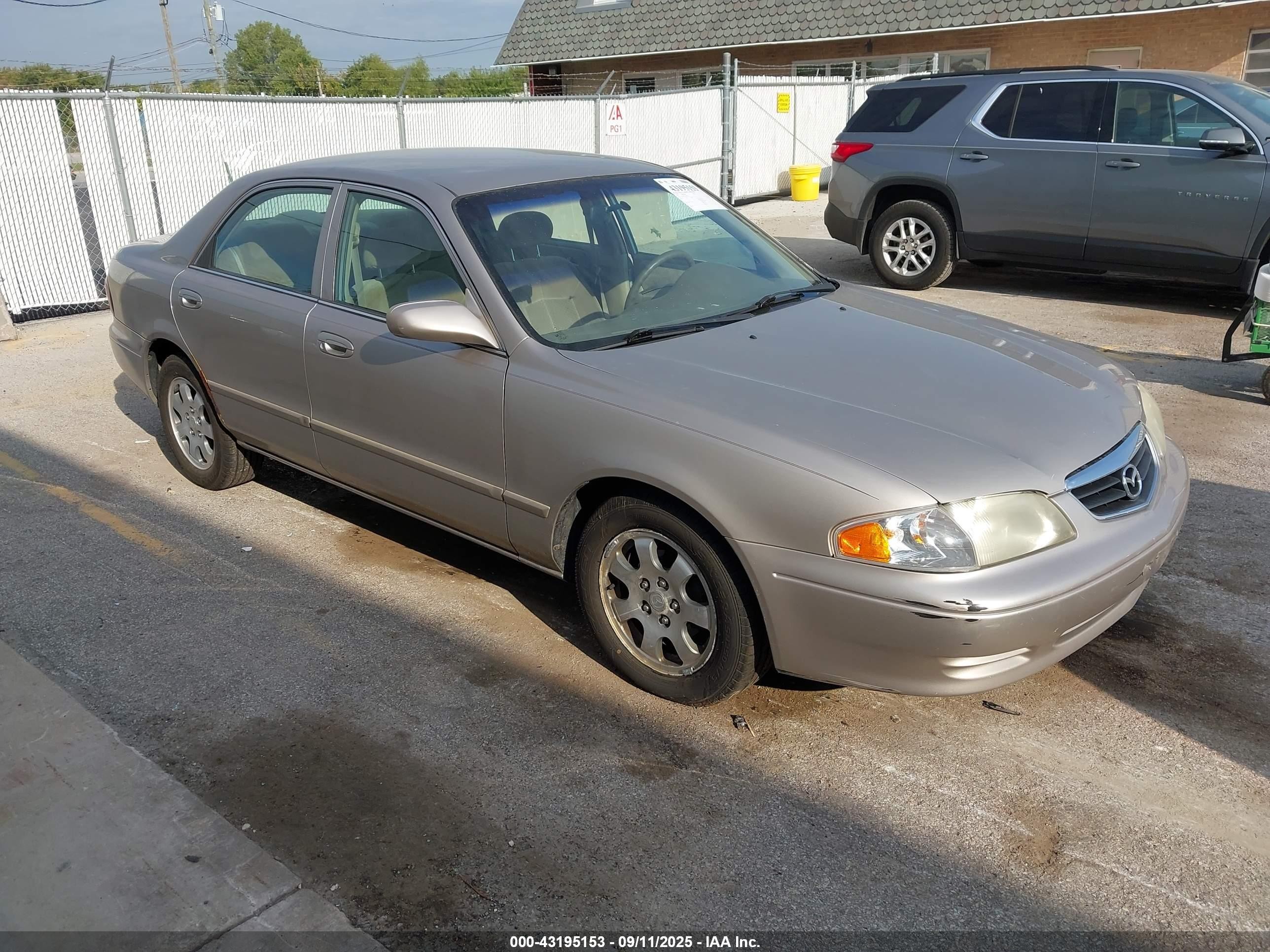 2002 Mazda 626 LX, VIN 1YVGF22C725284629 — Side
