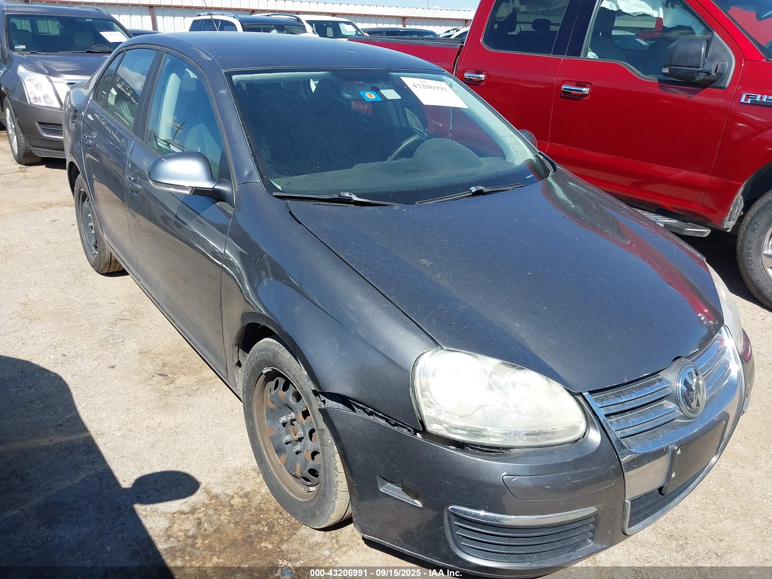2010 Volkswagen Jetta S, VIN 3VWJZ7AJ3AM099581 — Side