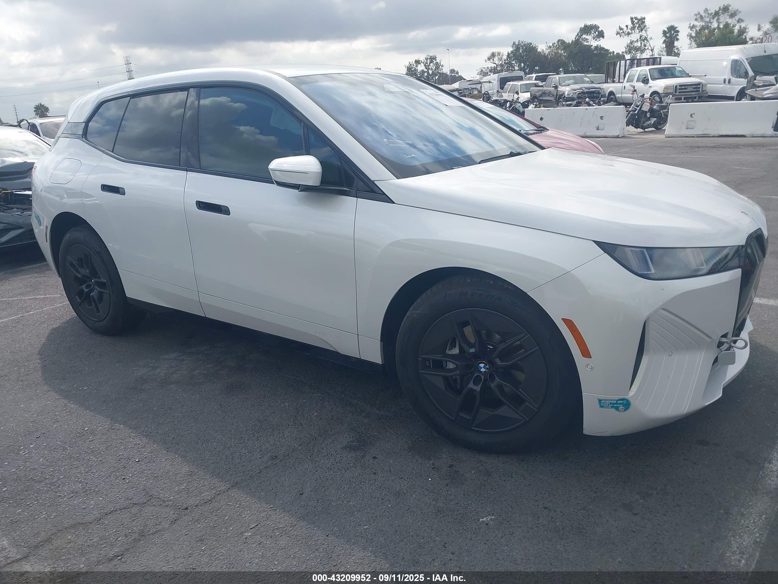 2026 BMW iX xDrive45, VIN WB543CF06TCV33423 — Side