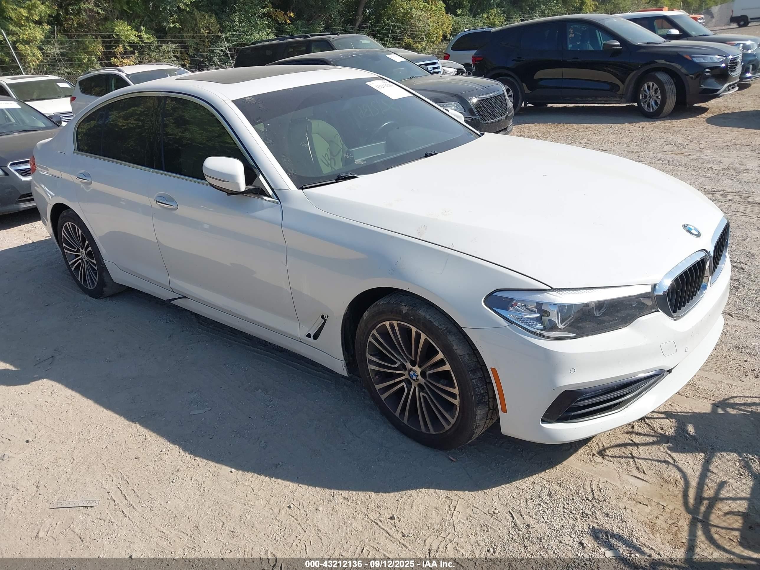 2018 BMW 5 Series 530i xDrive, VIN WBAJA7C58JG907604 — Side