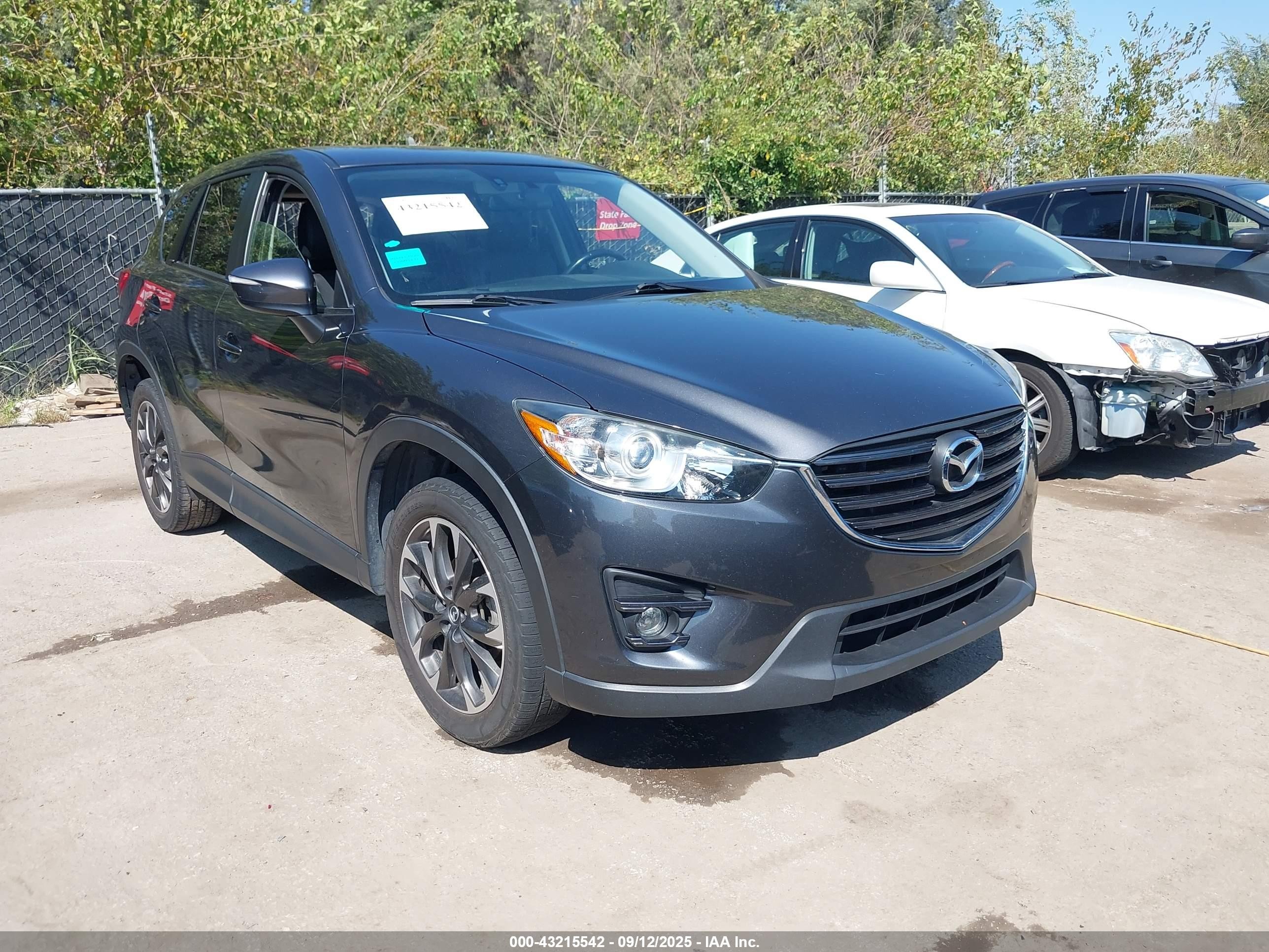 2016 Mazda CX-5 Grand Touring, VIN JM3KE4DYXG0767311 — Rear end