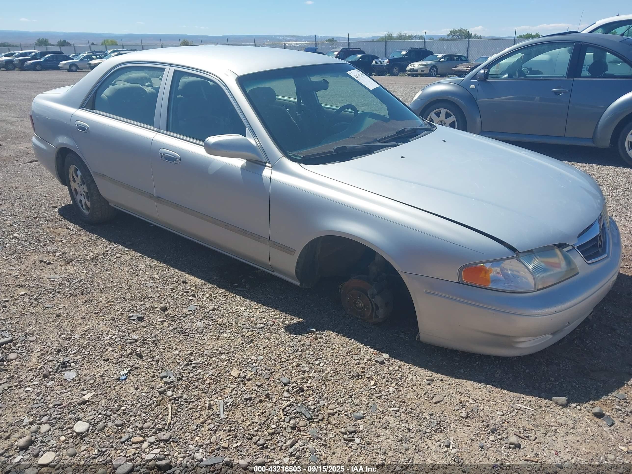 2000 Mazda 626 LX, VIN 1YVGF22C3Y5162620 — Front end