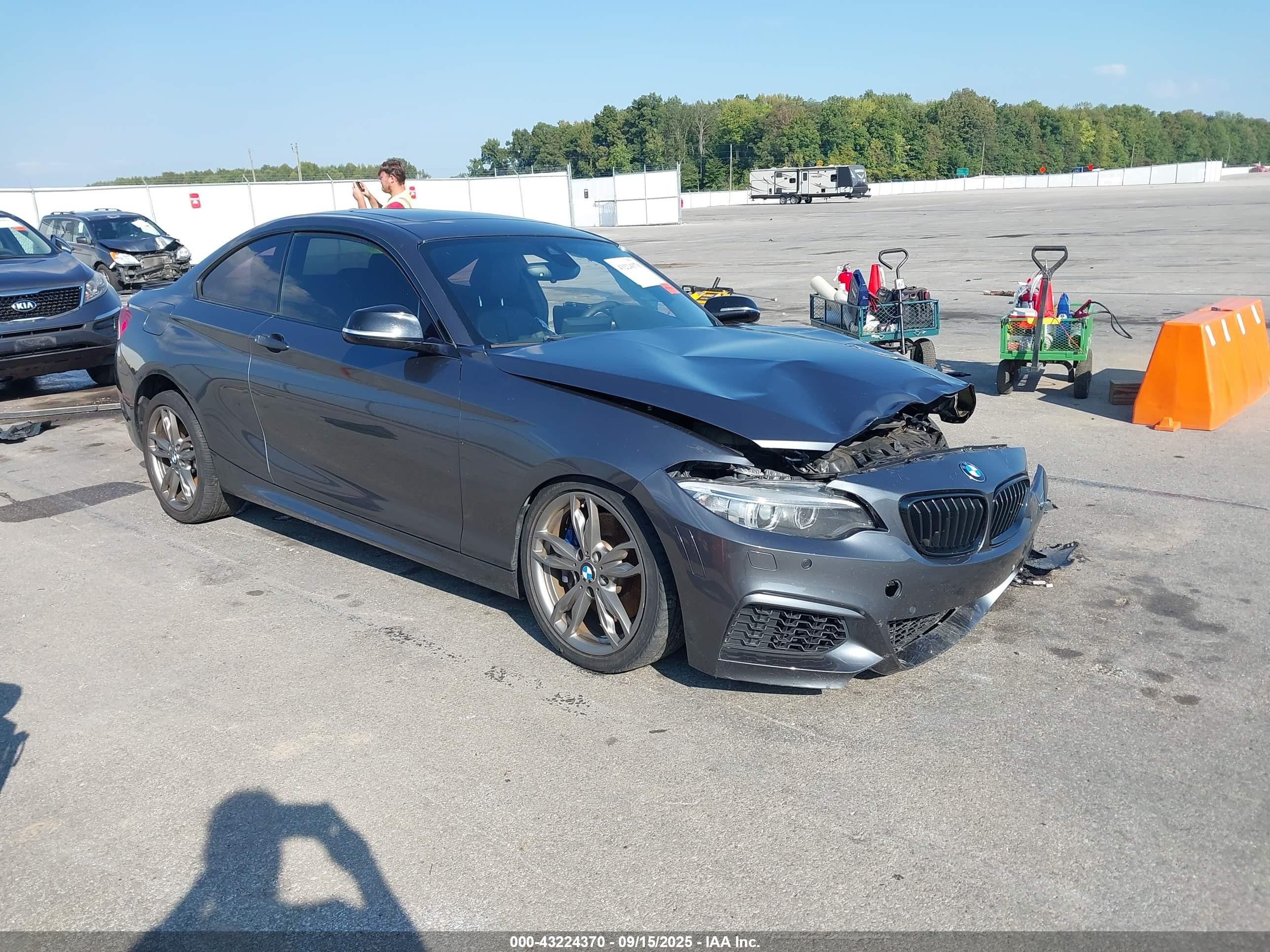 2015 BMW 2 Series M235i, VIN WBA1J7C54FV289118 — Side