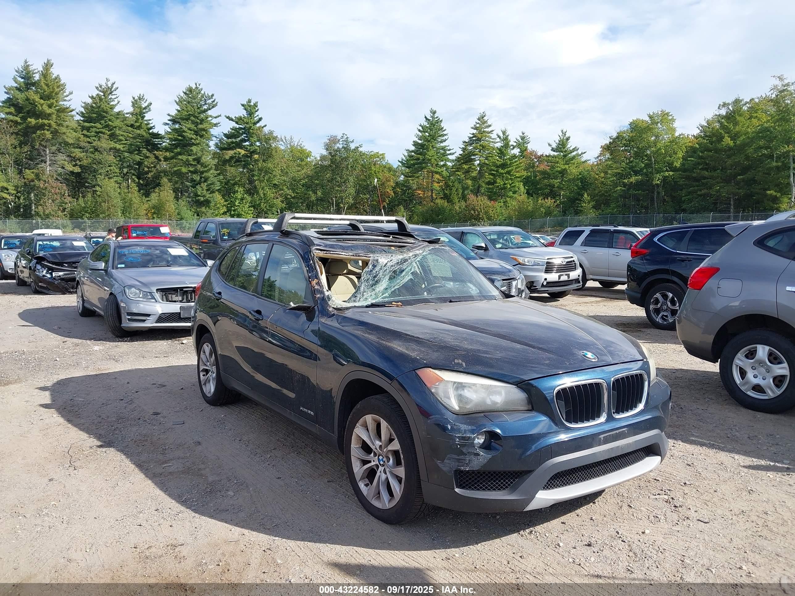 2014 BMW X1 xDrive28i, VIN WBAVL1C58EVY22420 — Storm