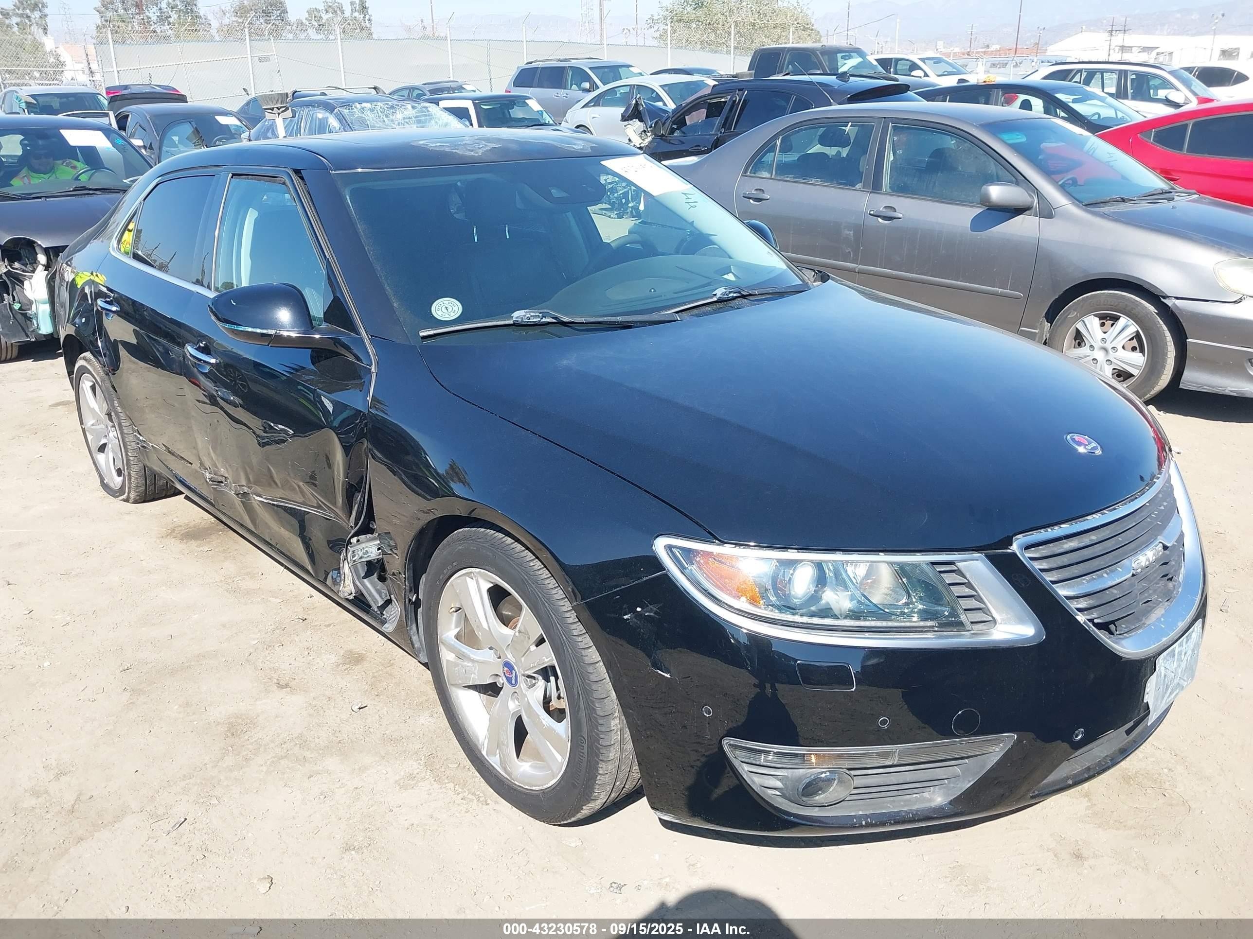 2011 Saab 9-5 Turbo4, VIN YS3GN4AR4B4001659 — Side