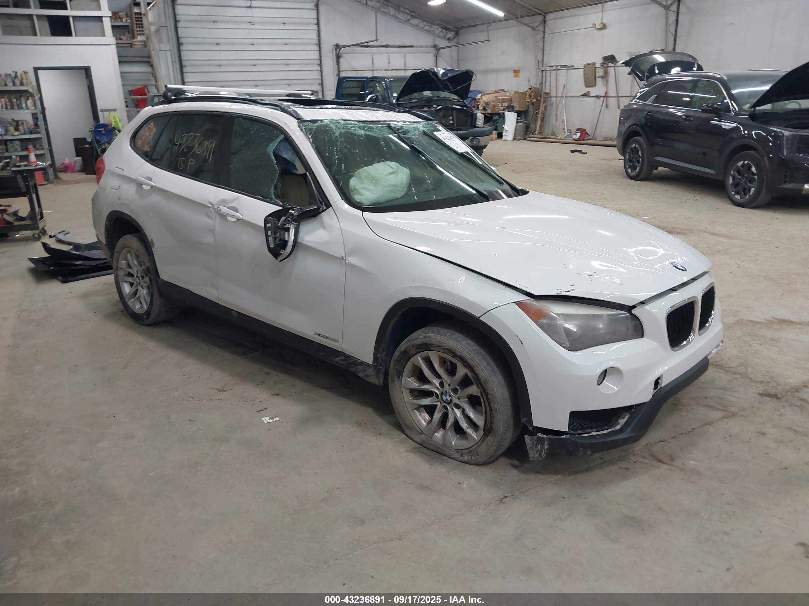 2015 BMW X1 xDrive28i, VIN WBAVL1C5XFVY30150 — Rollover