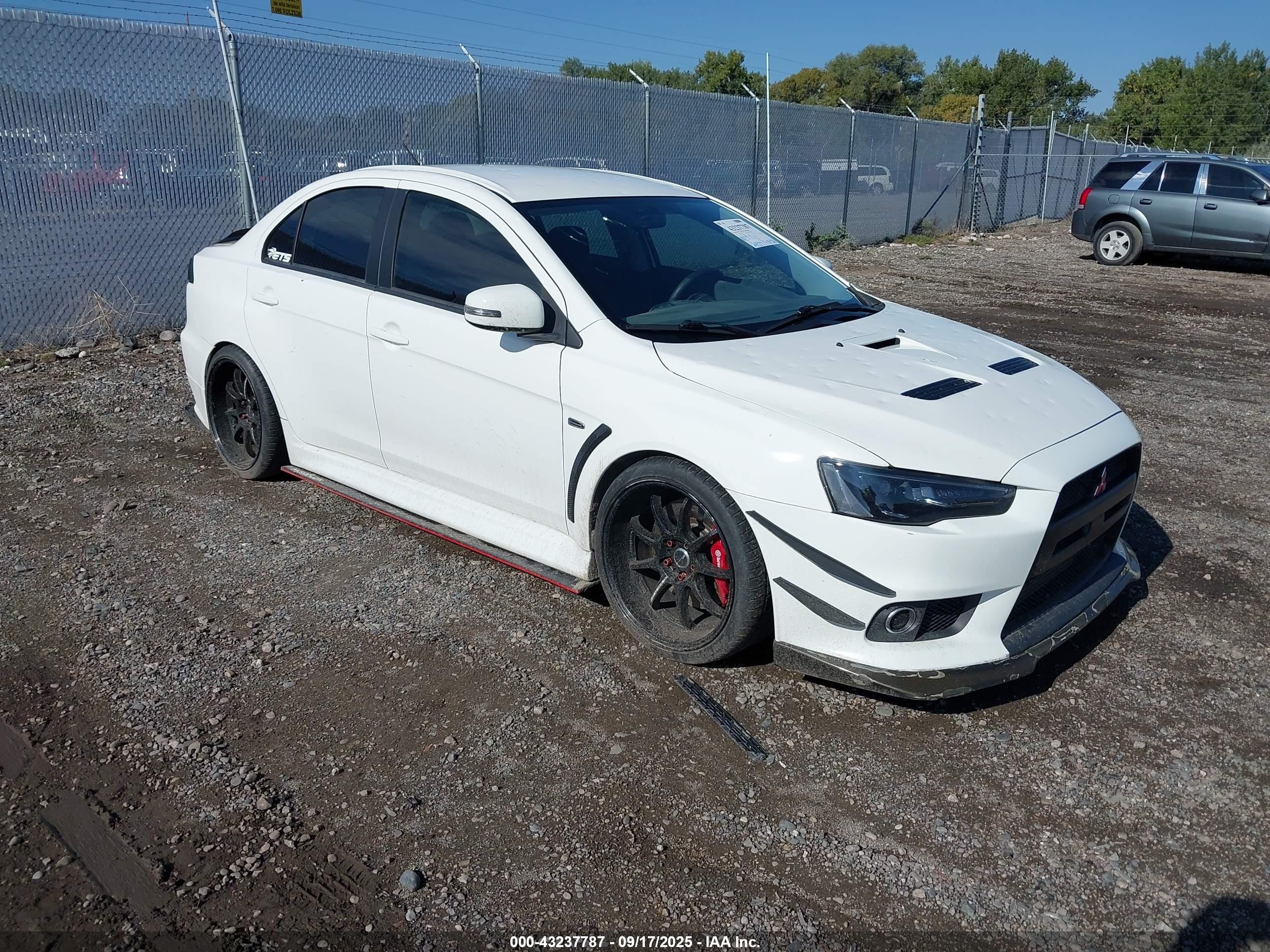 2015 Mitsubishi Lancer Evolution GSR, VIN JA32W8FV0FU011332 — Hail