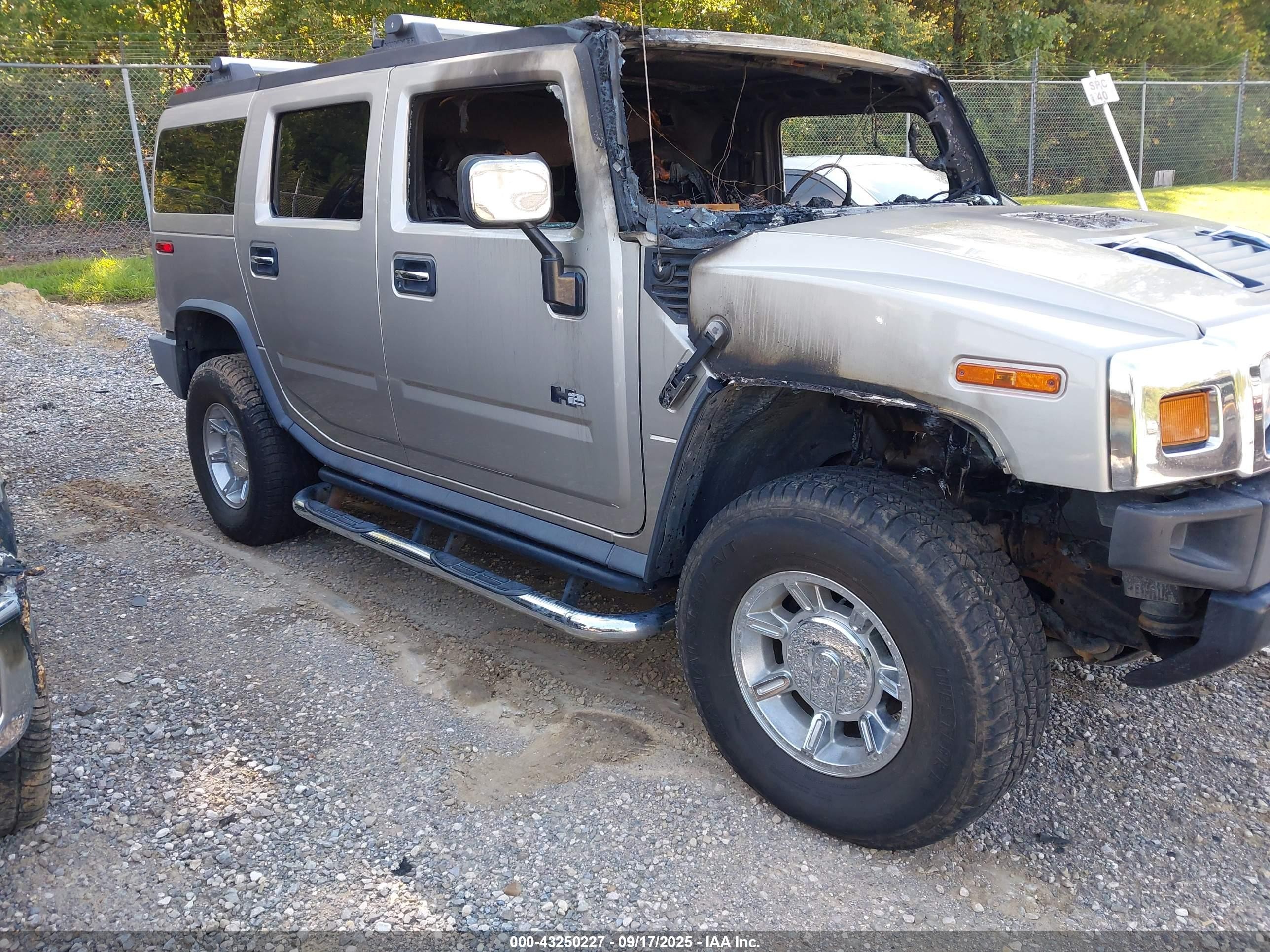 2005 Hummer H2 SUV, VIN 5GRGN23U15H126112 — Interior fire