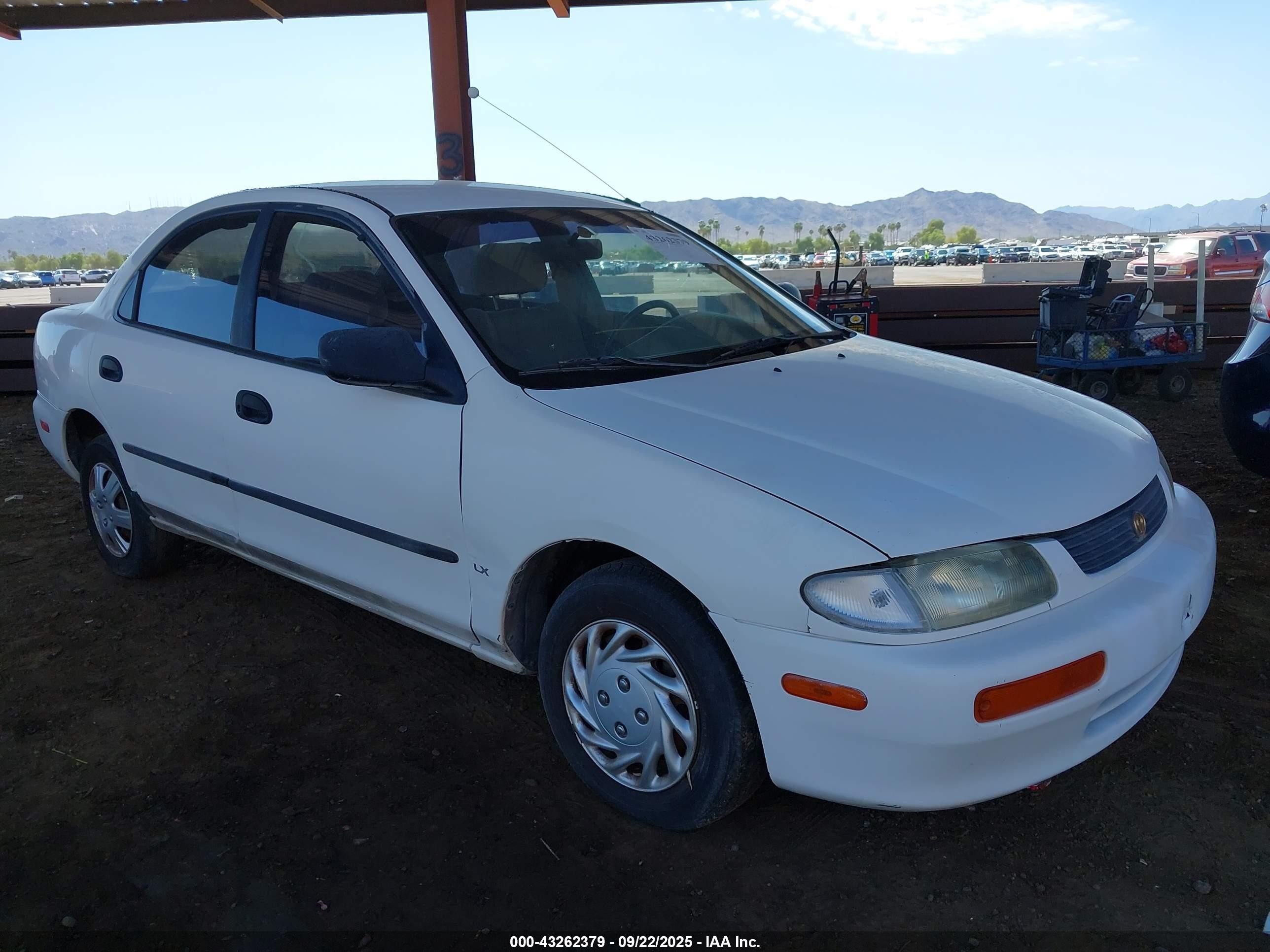 1995 Mazda Protege, VIN JM1BA1412S0165405 — Механическое