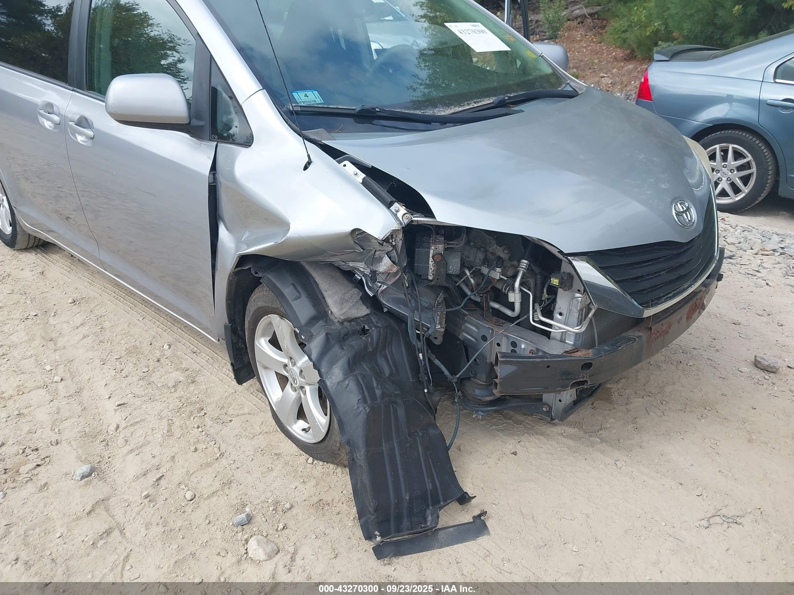 2011 Toyota Sienna LE AAS, VIN 5TDKK3DC9BS172830 — Front end