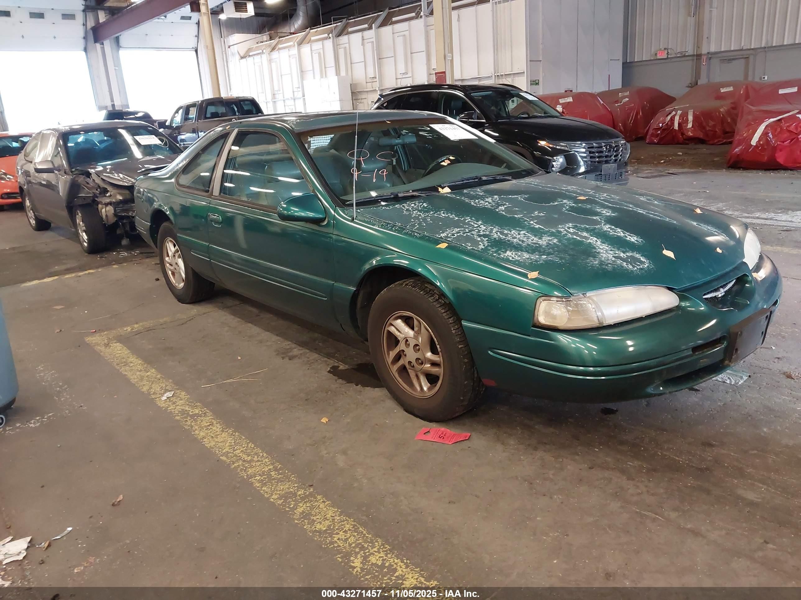 1997 Ford Thunderbird LX, VIN 1FALP62W5VH140122 — Side