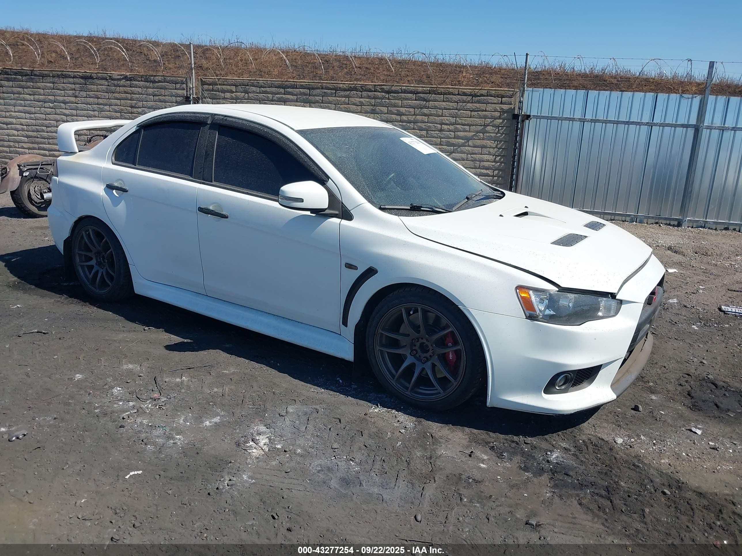2015 Mitsubishi Lancer Evolution GSR, VIN JA32W8FV6FU017796 — Water / flood