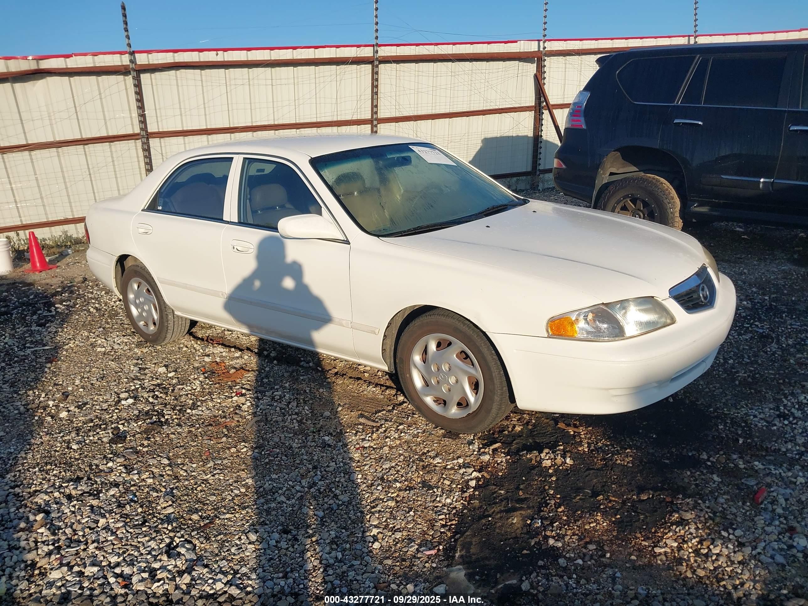 2000 Mazda 626 LX, VIN 1YVGF22CXY5139769 — Normal wear