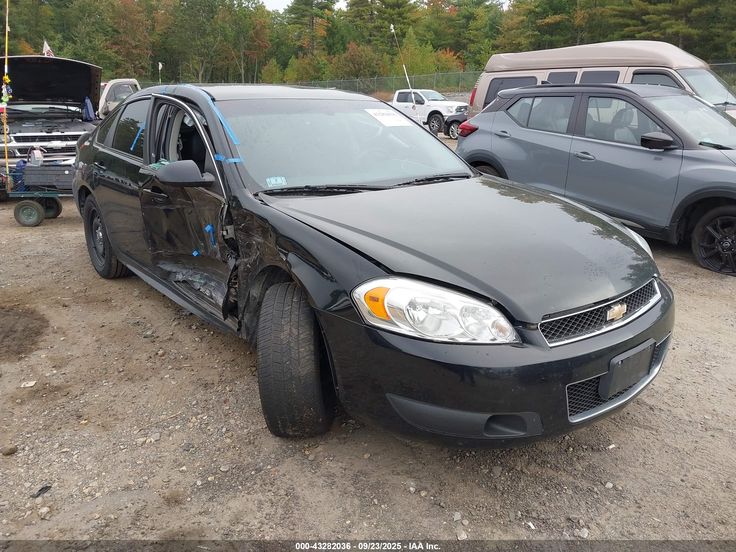 2015 Chevrolet Impala Police Police, VIN 2G1WD5E38F1134128 — Side
