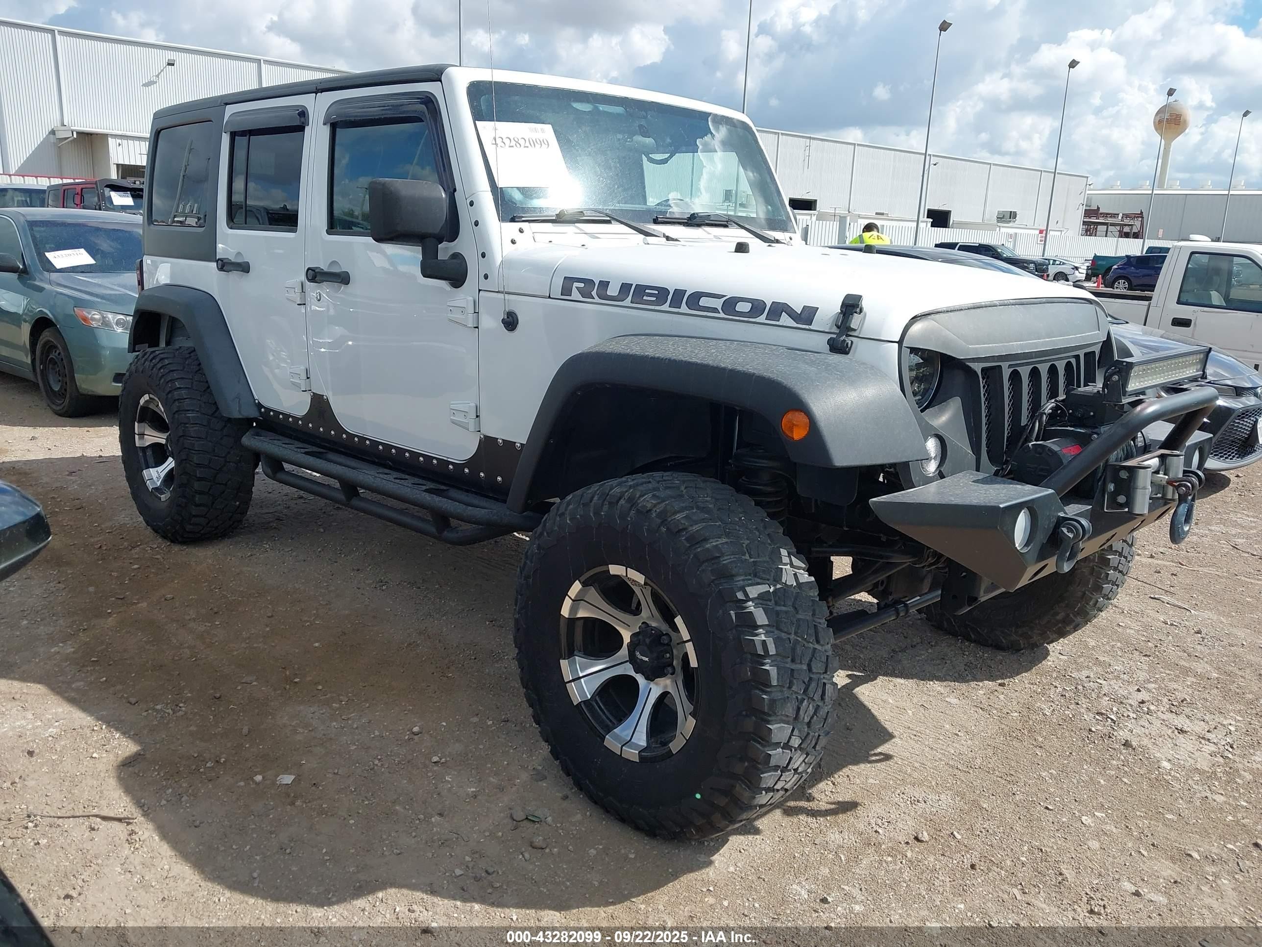 2011 Jeep Wrangler Unlimited Rubicon, VIN 1J4BA6H10BL536027 — Фото с аукциона