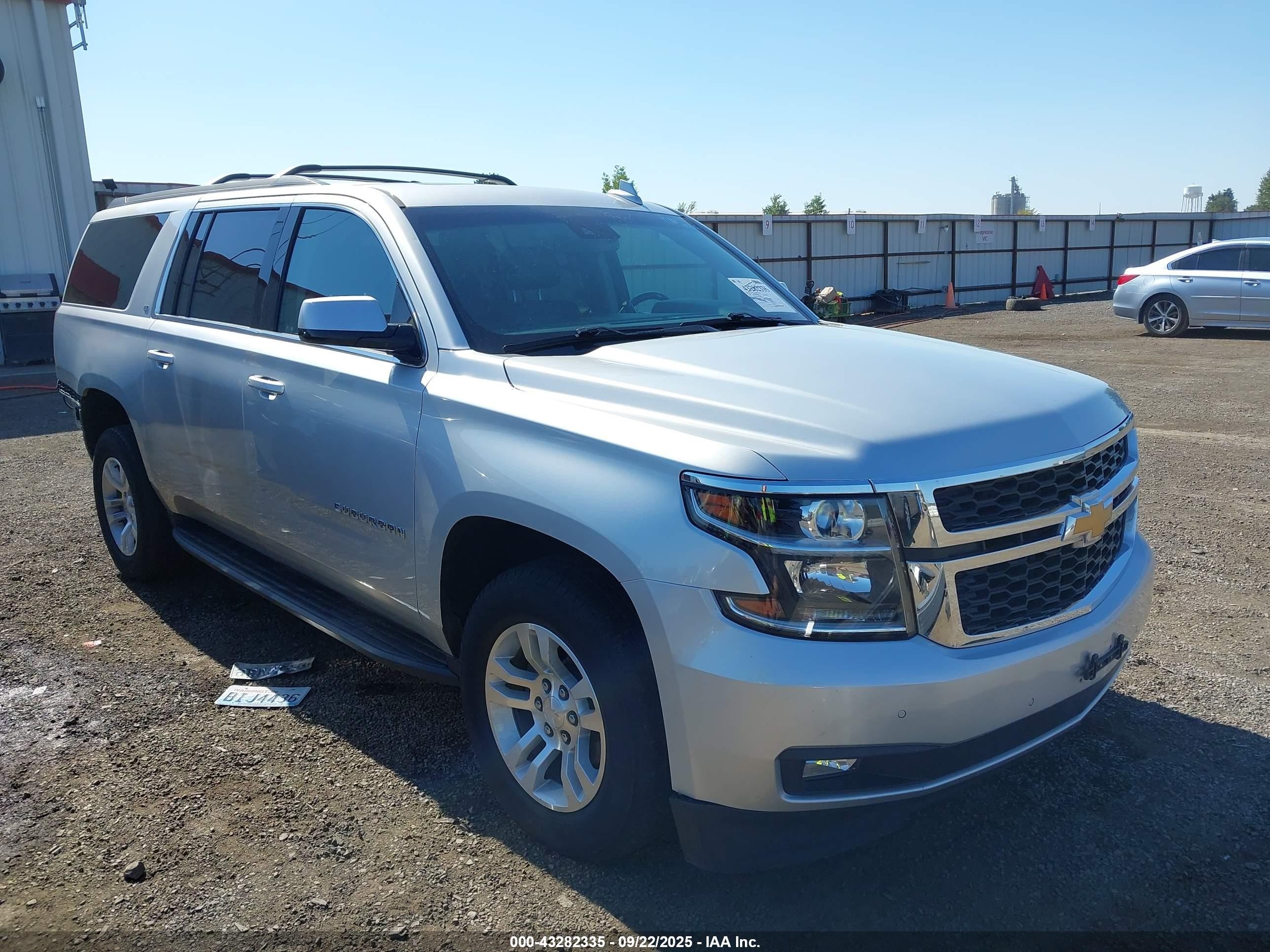 2019 Chevrolet Suburban LT, VIN 1GNSKHKCXKR314415 — Rear end