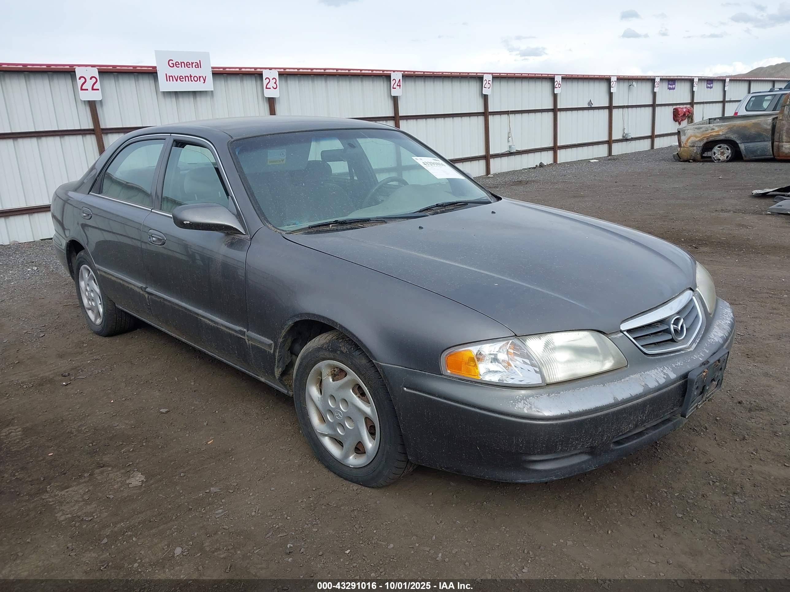2001 Mazda 626 LX, VIN 1YVGF22C515227084 — Перед
