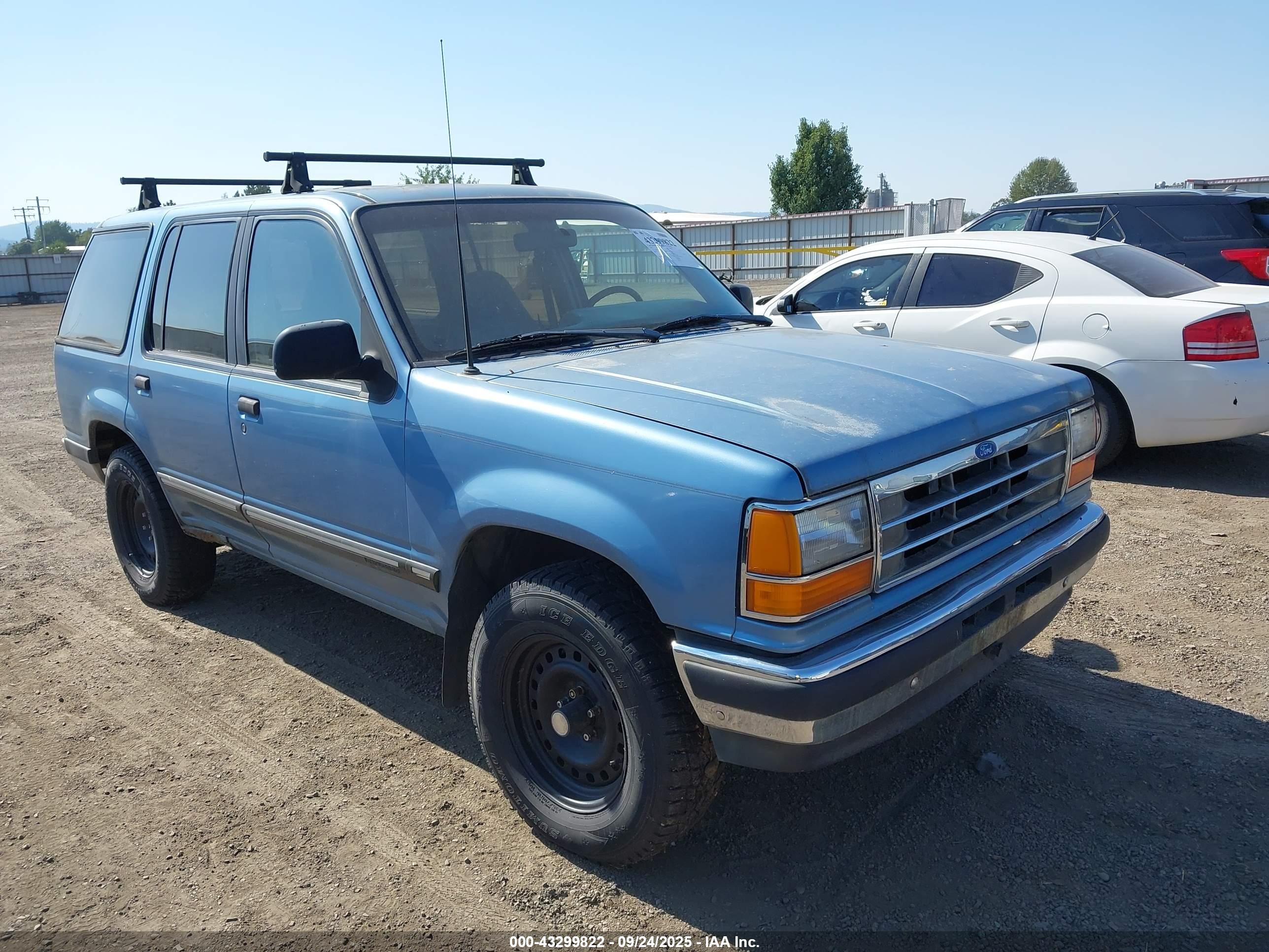 1991 Ford Explorer Eddie Bauer, VIN 1FMDU34X2MUE11988 — Side