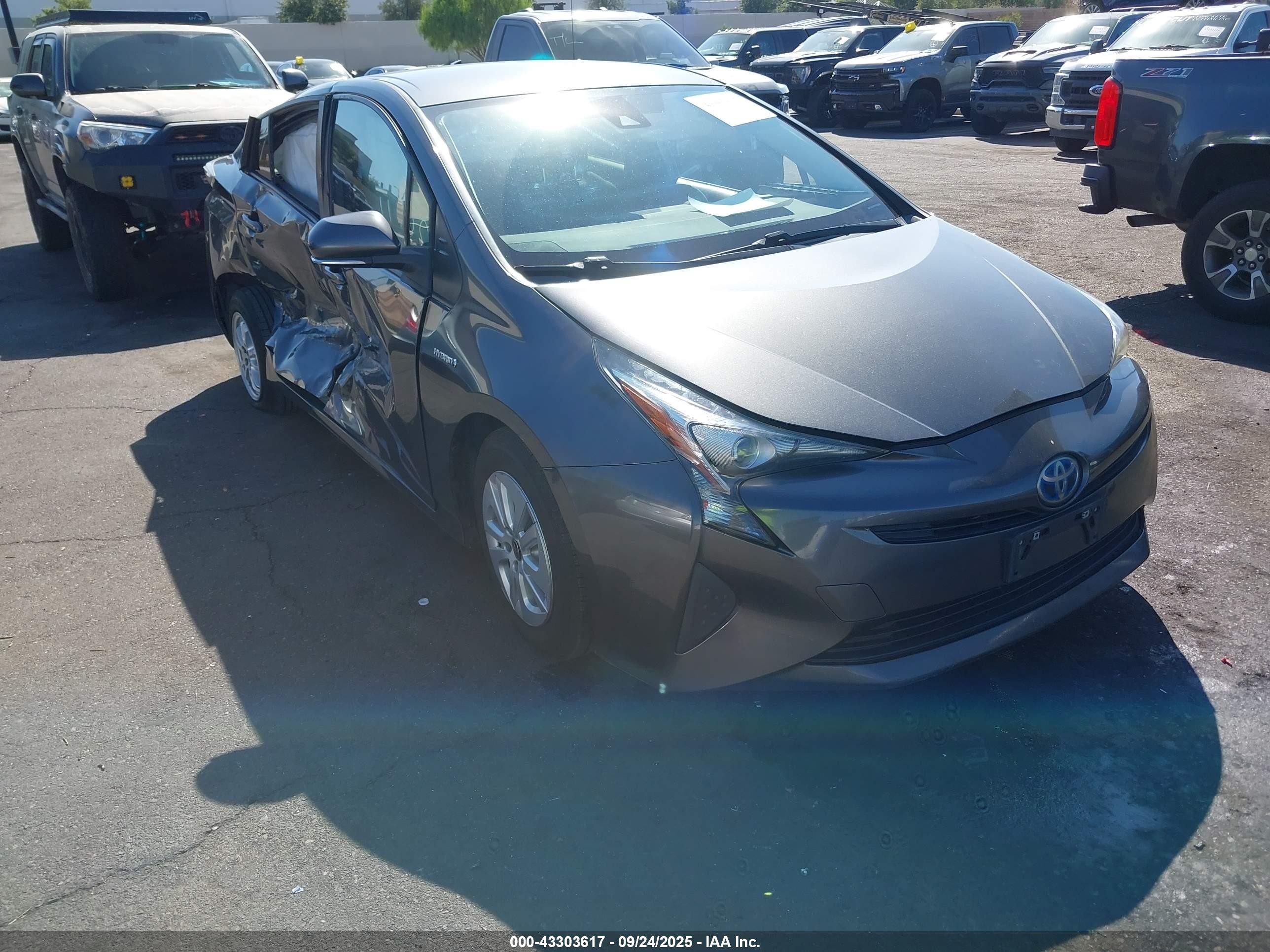2017 Toyota Prius Two, VIN JTDKBRFUXH3037827 — Side