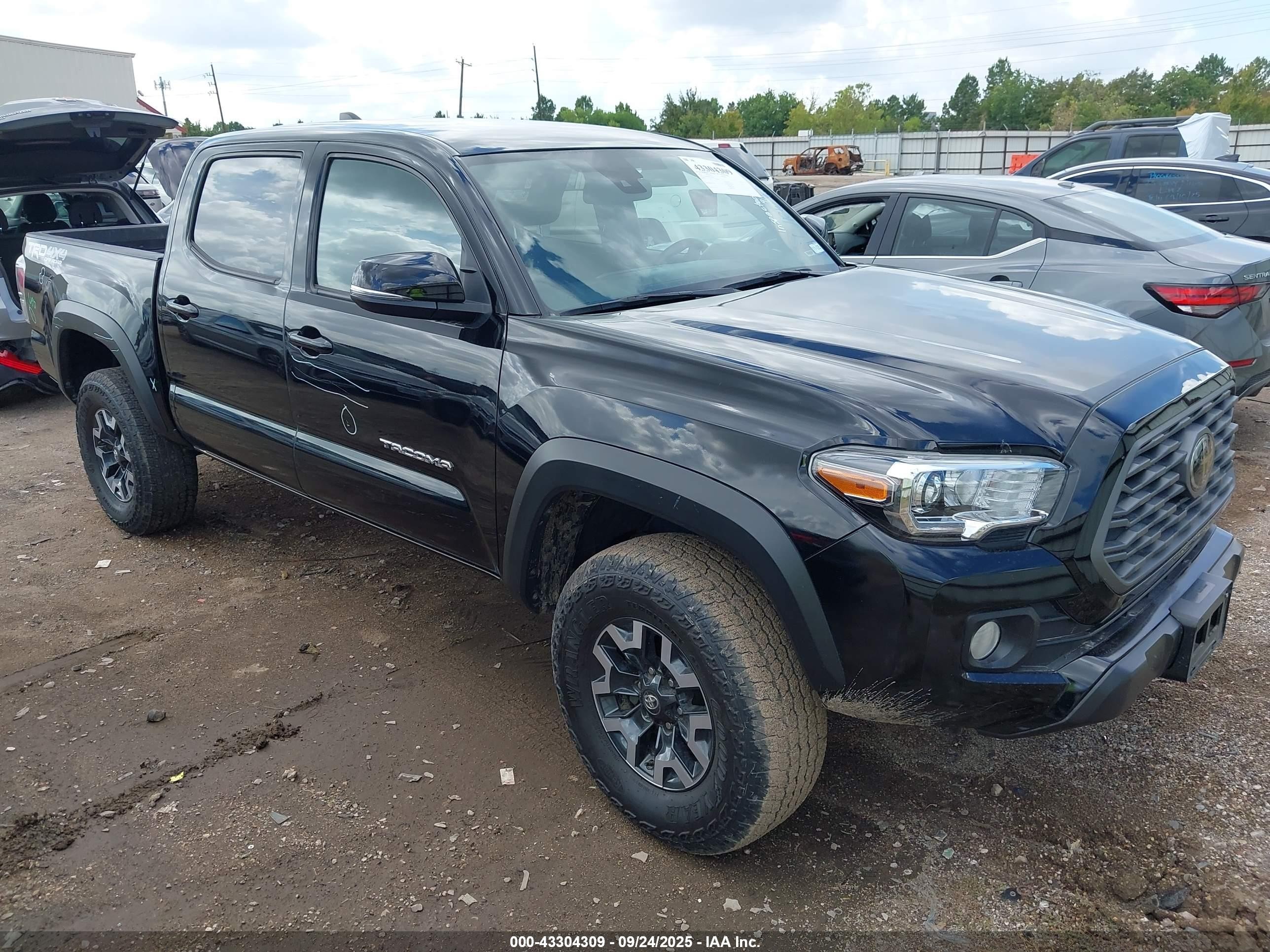 2023 Toyota Tacoma SR, VIN 3TYCZ5AN7PT173052 — Side