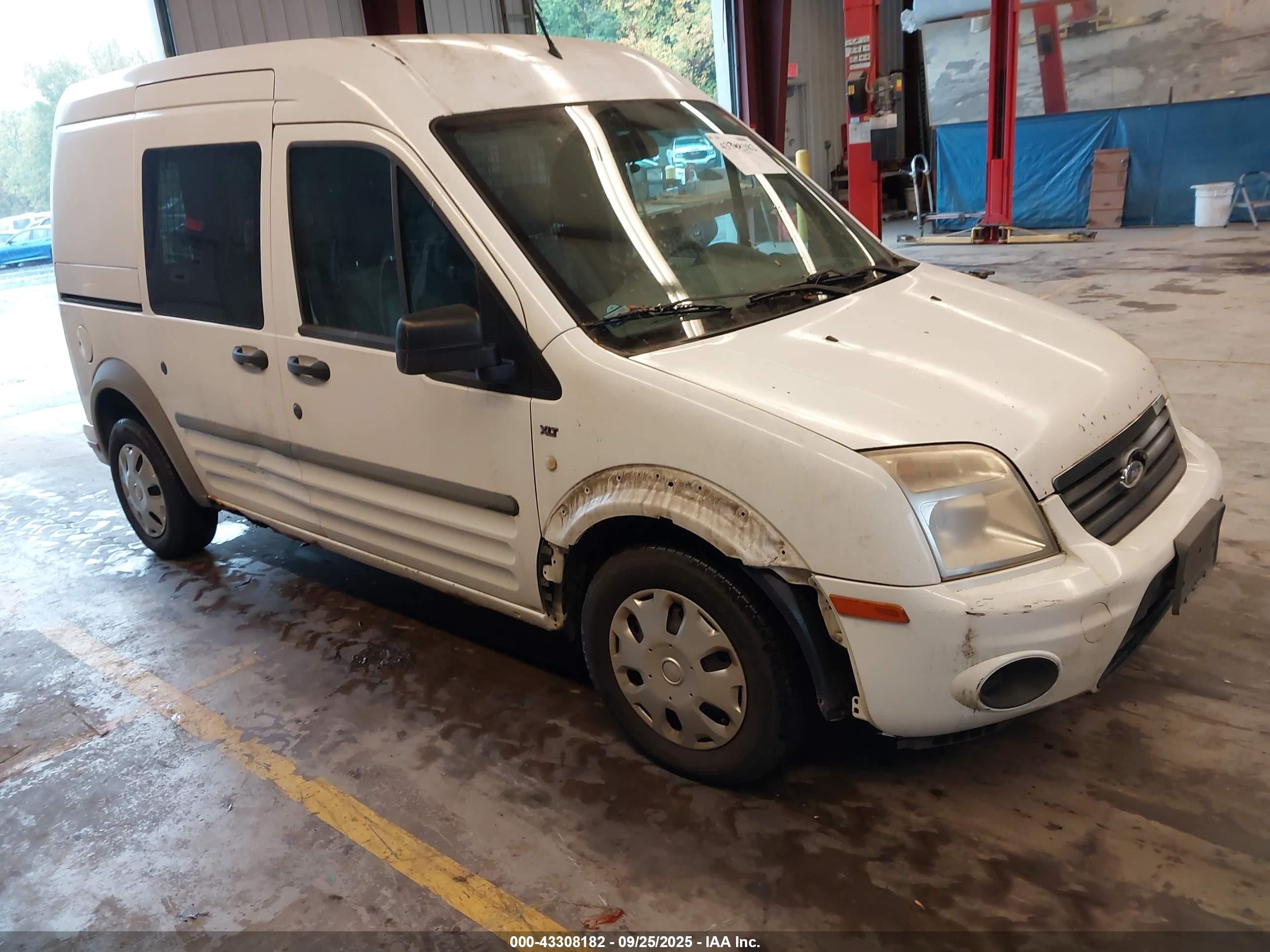 2010 Ford Transit Connect XLT, VIN NM0LS6BN1AT001514 — Side