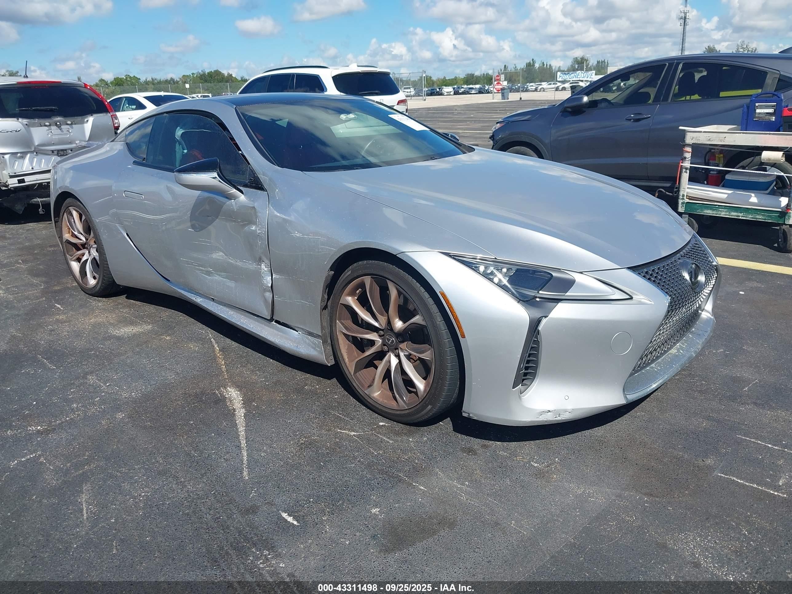 2021 Lexus LC 500h, VIN JTHBP5AYXMA101244 — Фото с аукциона 1 of 5