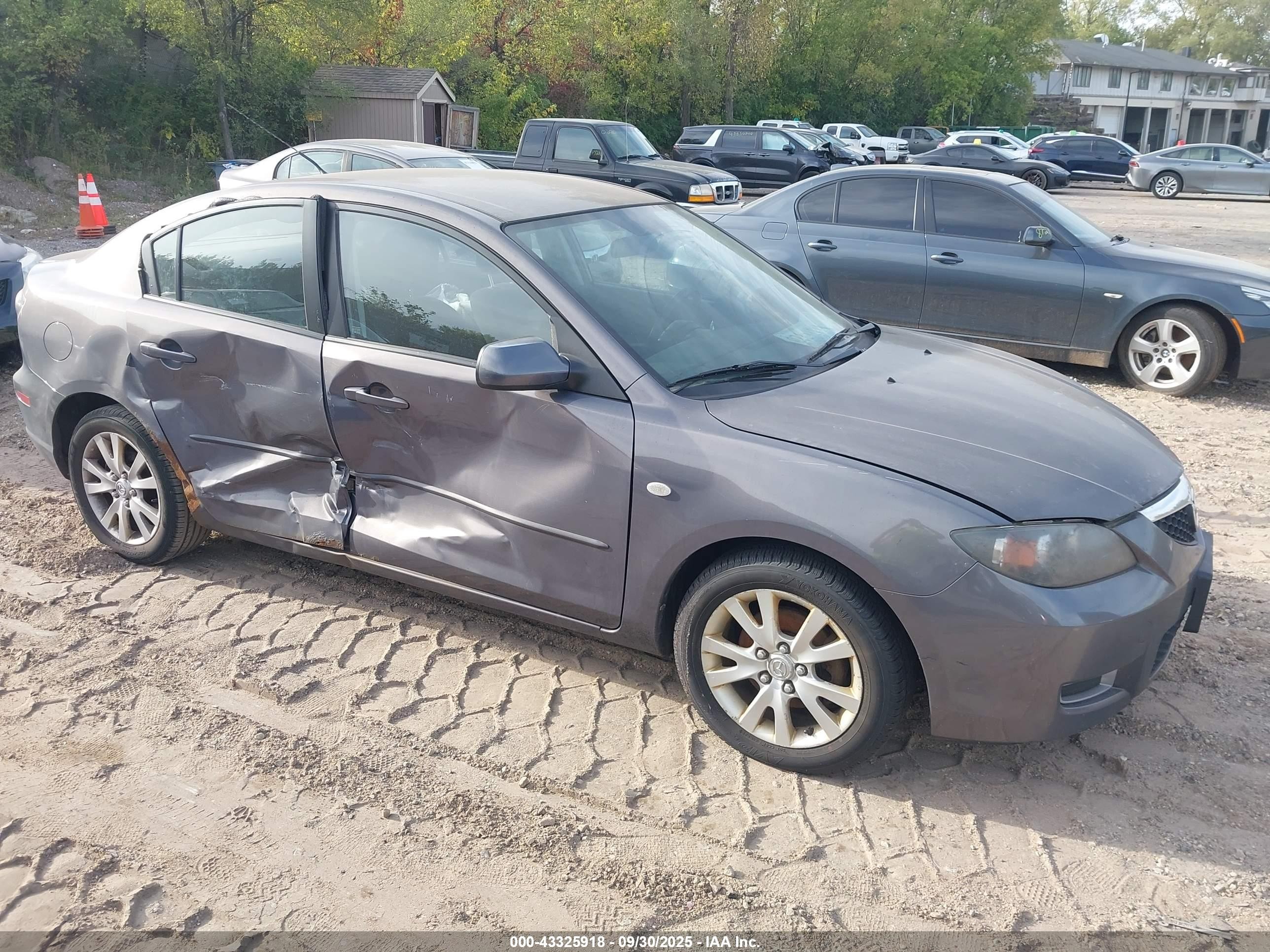 2007 Mazda 3 i Touring, VIN JM1BK12F071628879 — Side