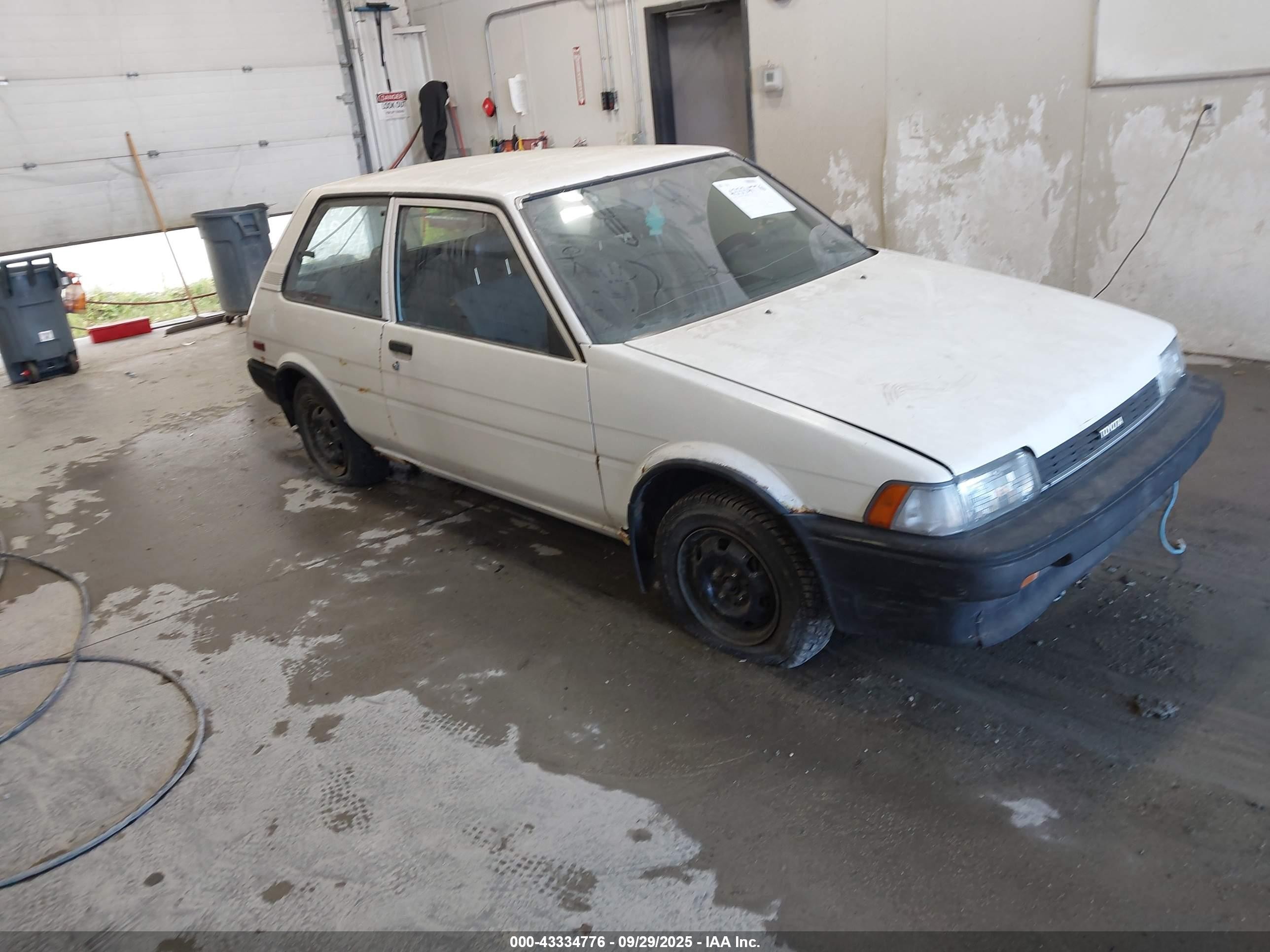 1987 Toyota Corolla, VIN 1NXAE82G6HZ426435 — Side