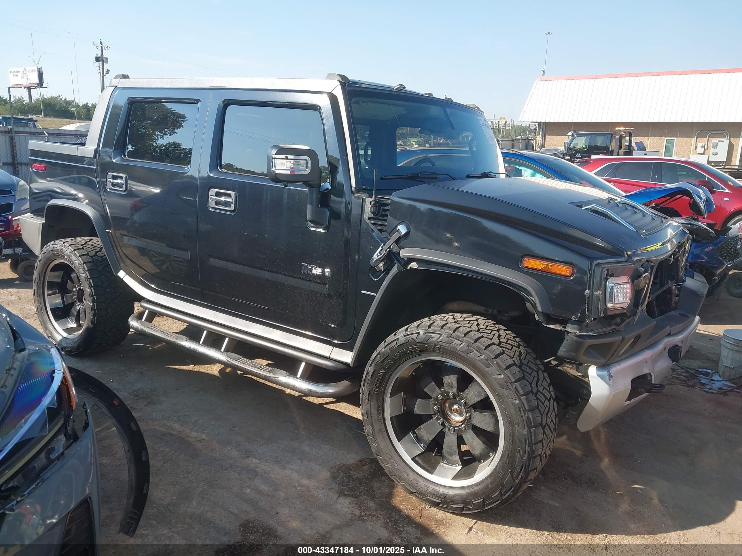 2009 Hummer H2, VIN 5GRGN02209H100031 — Front end