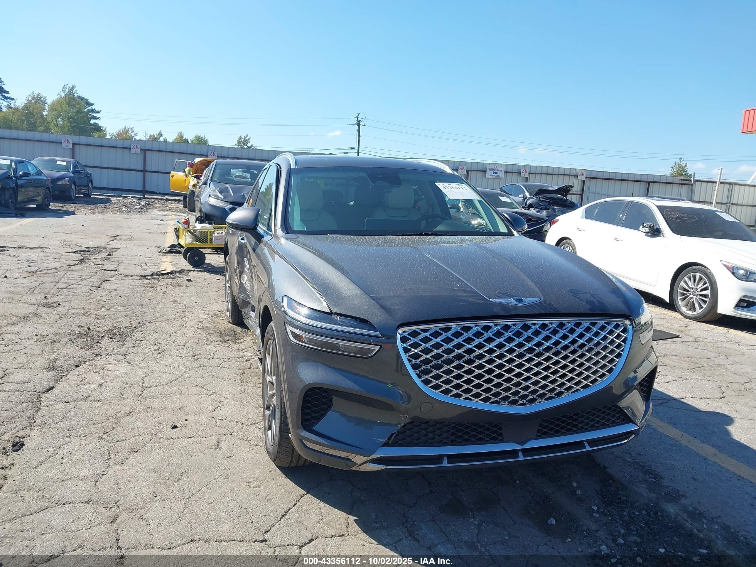 2023 Genesis GV70 2.5T, VIN KMUMADTB6PU087888 — Side