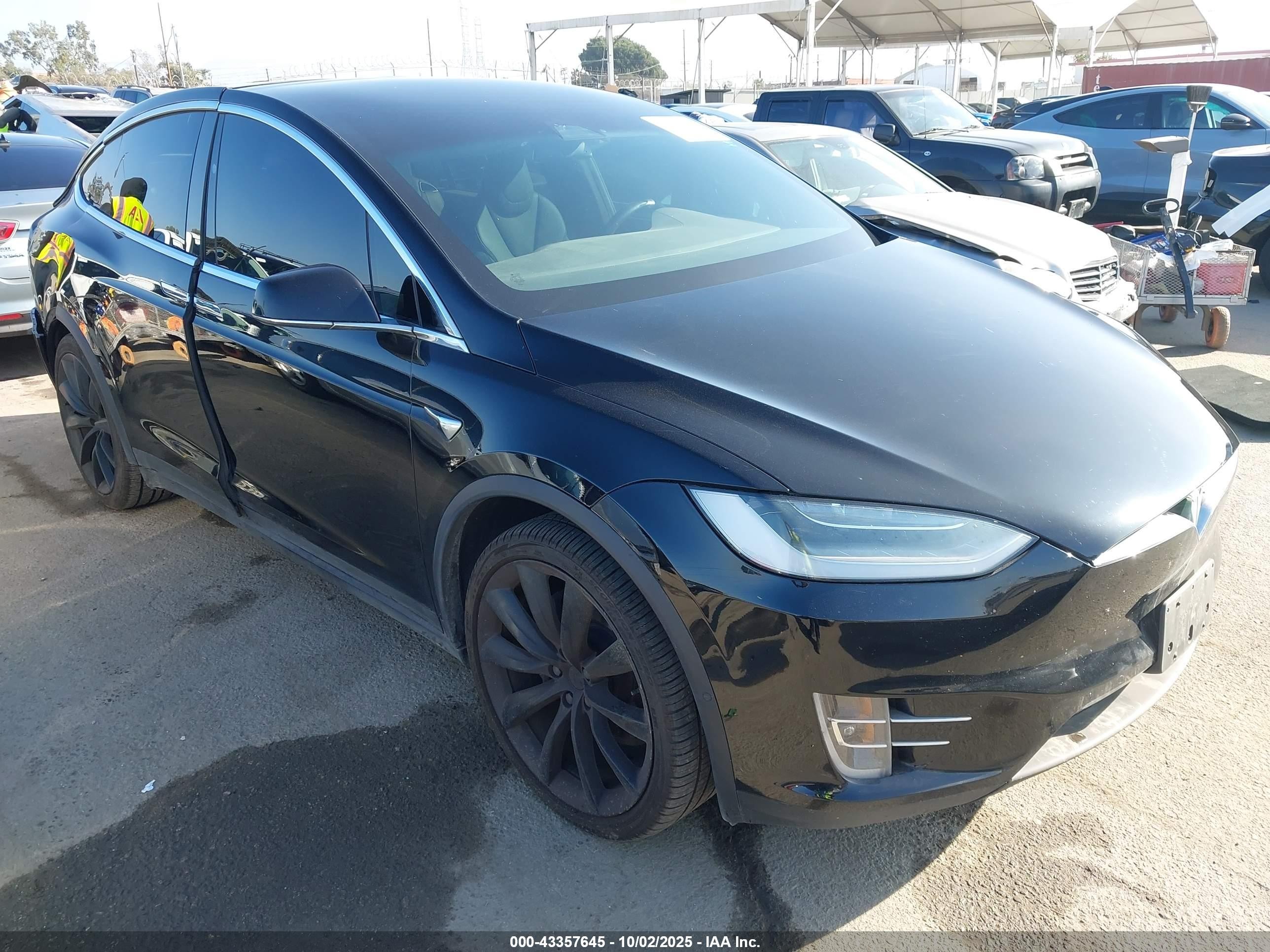 2019 Tesla Model X 75D, VIN 5YJXCAE23KF183629 — Rear end