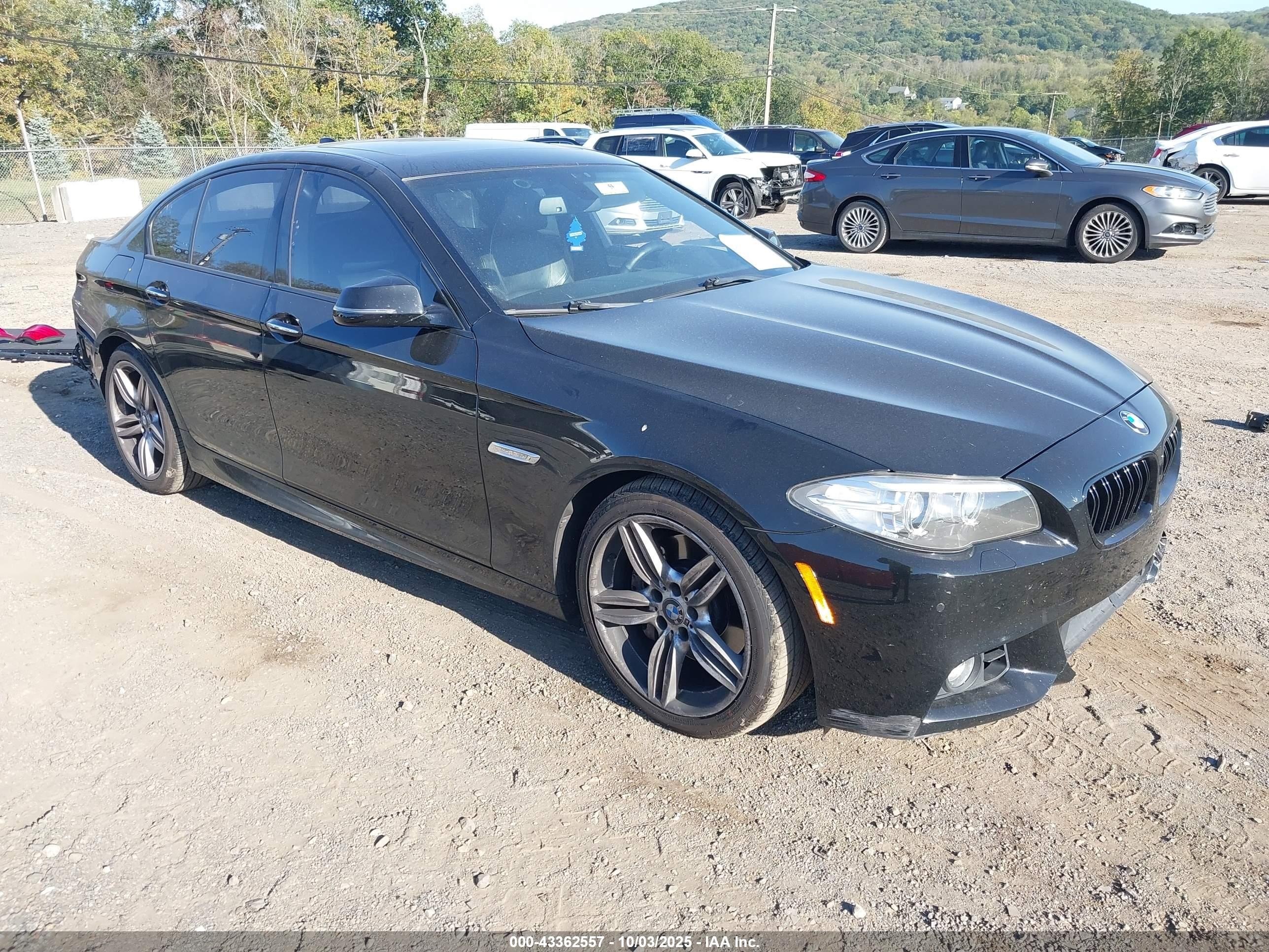 2016 BMW 5 Series 535i, VIN WBA5B1C5XGG551743 — Side