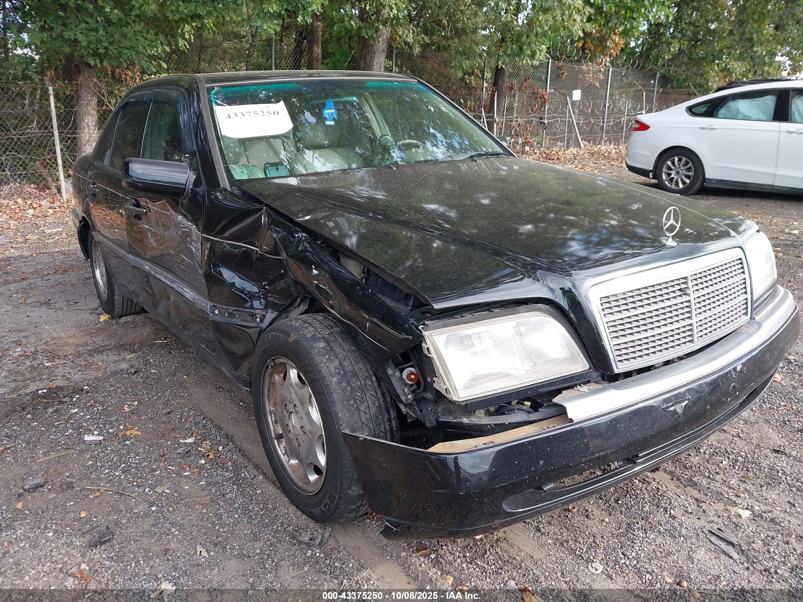 1996 Mercedes-Benz C, VIN WDBHA28E4TF380228 — Side