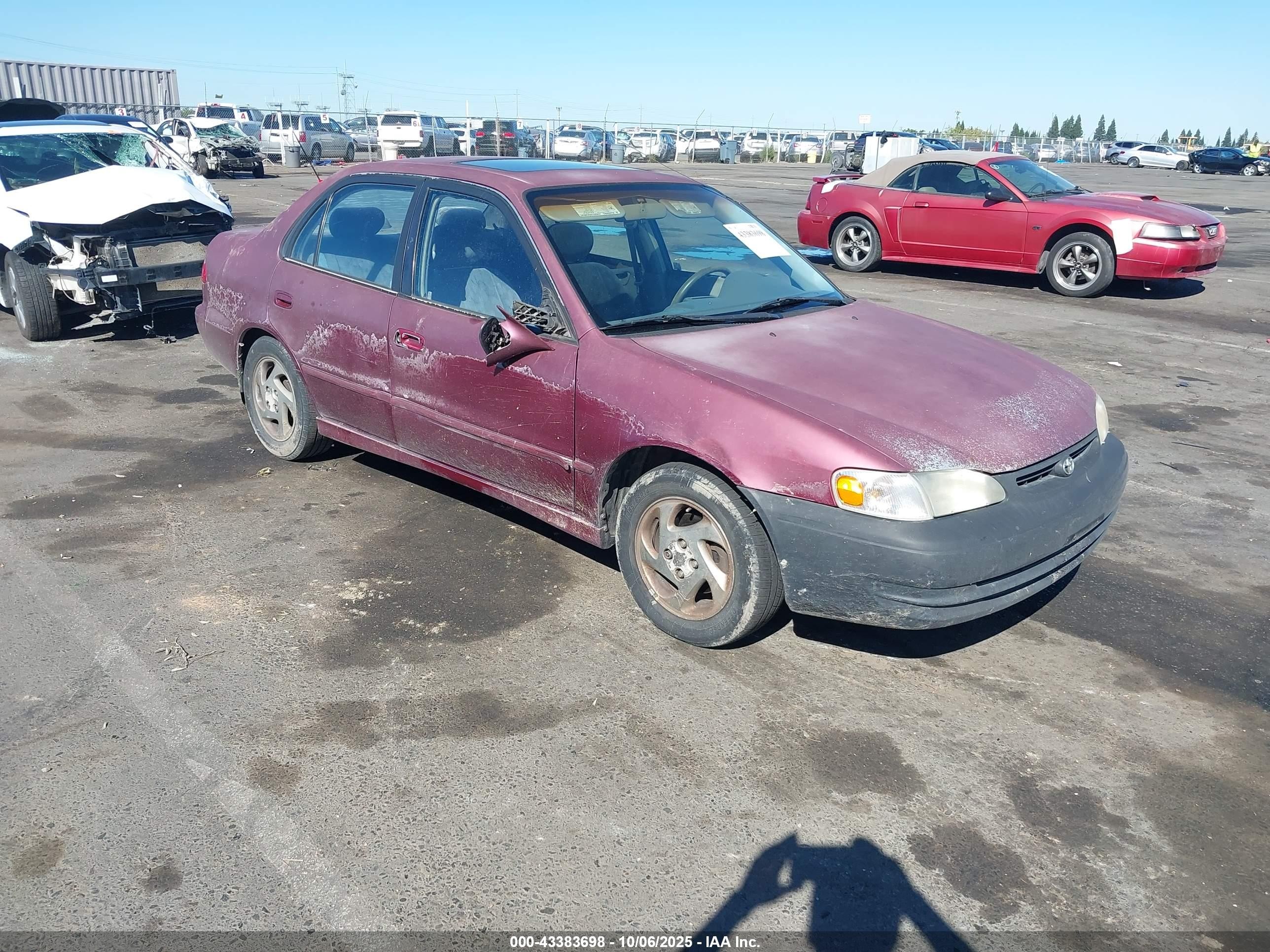 1998 Toyota Corolla VE, VIN 1NXBR18E2WZ084937 — Side