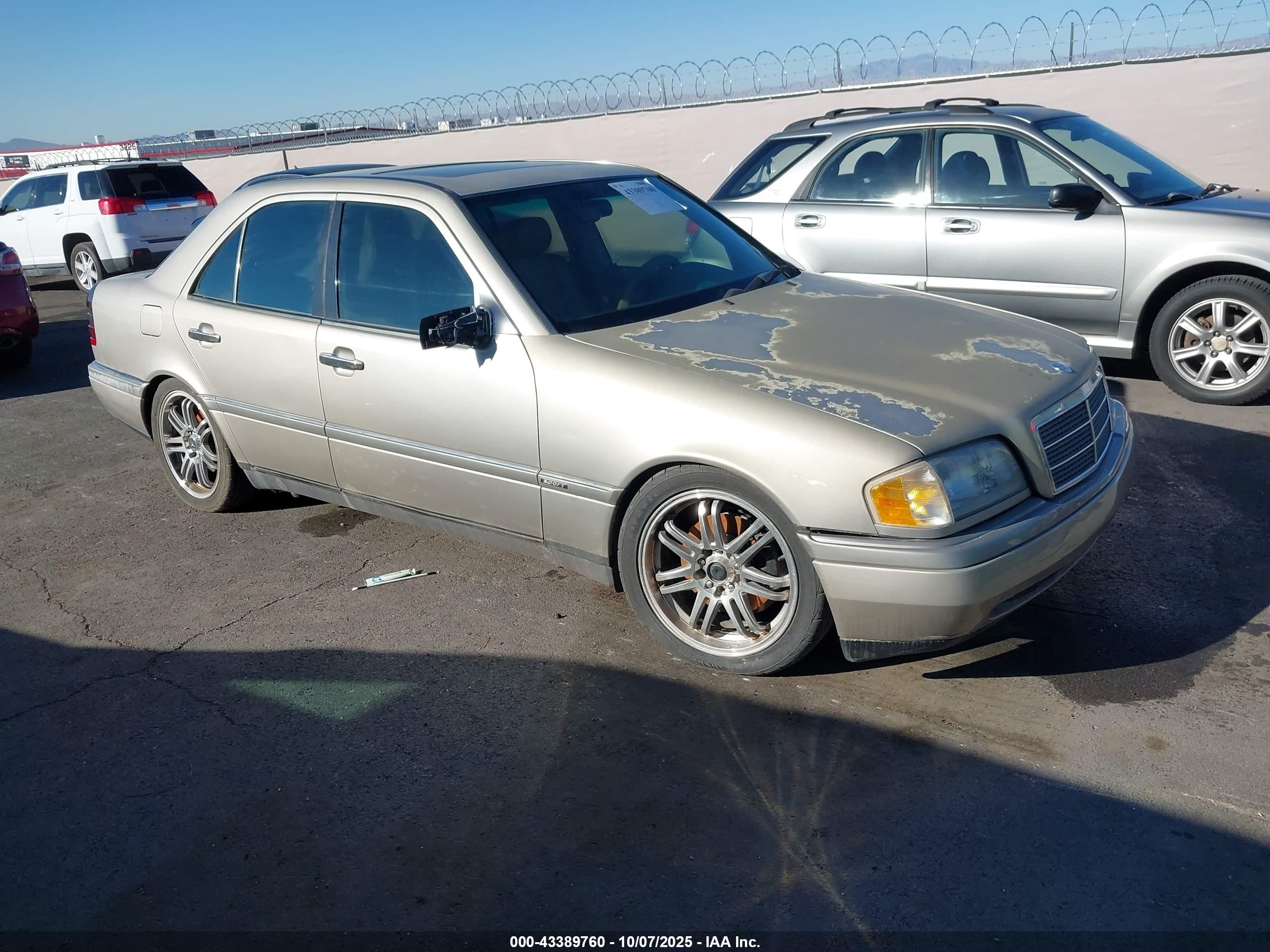 1996 Mercedes-Benz C, VIN WDBHA28E6TF411320 — Side