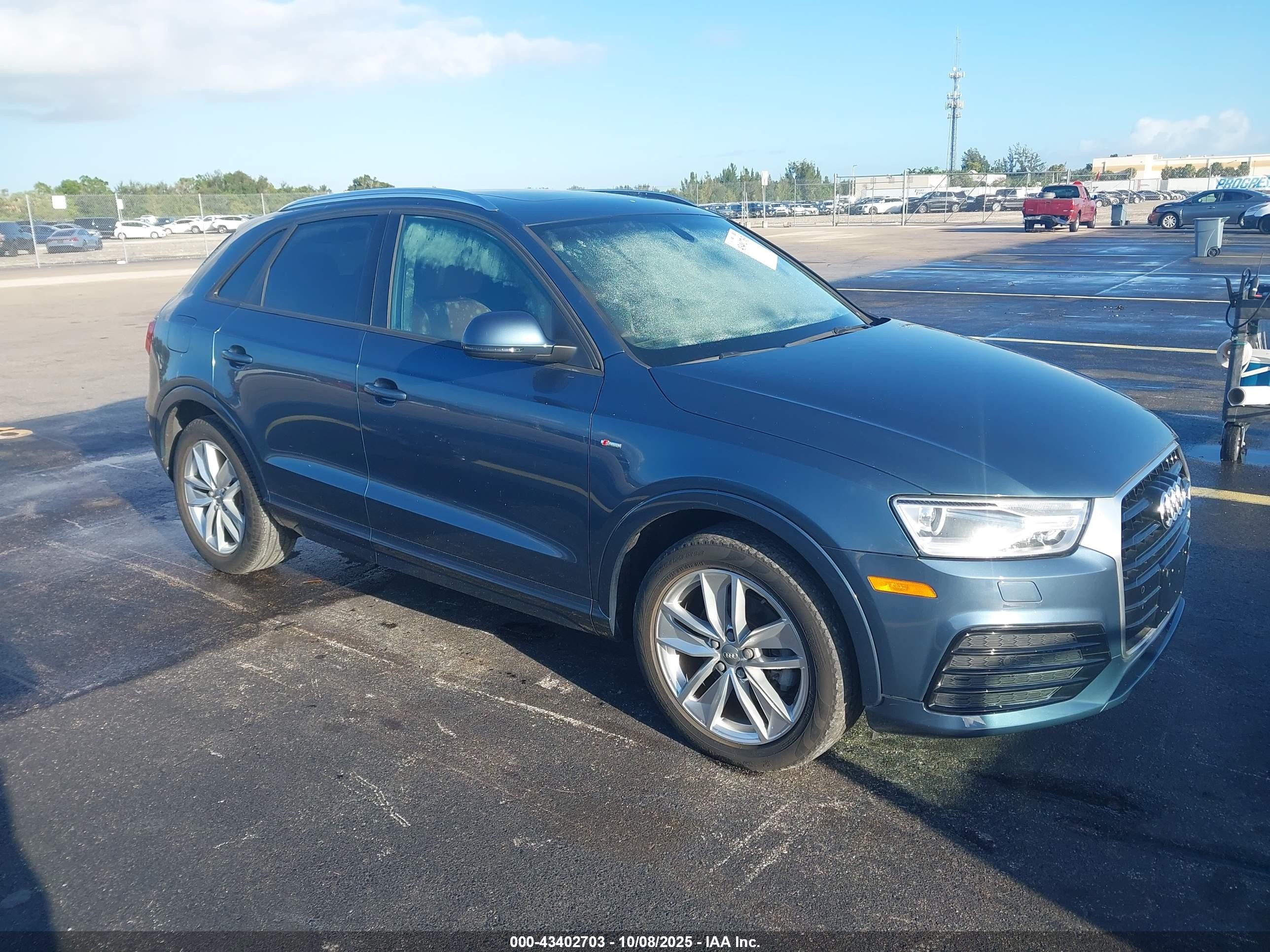 2018 Audi Q3 Premium, VIN WA1BCCFS9JR008776 — Water / flood