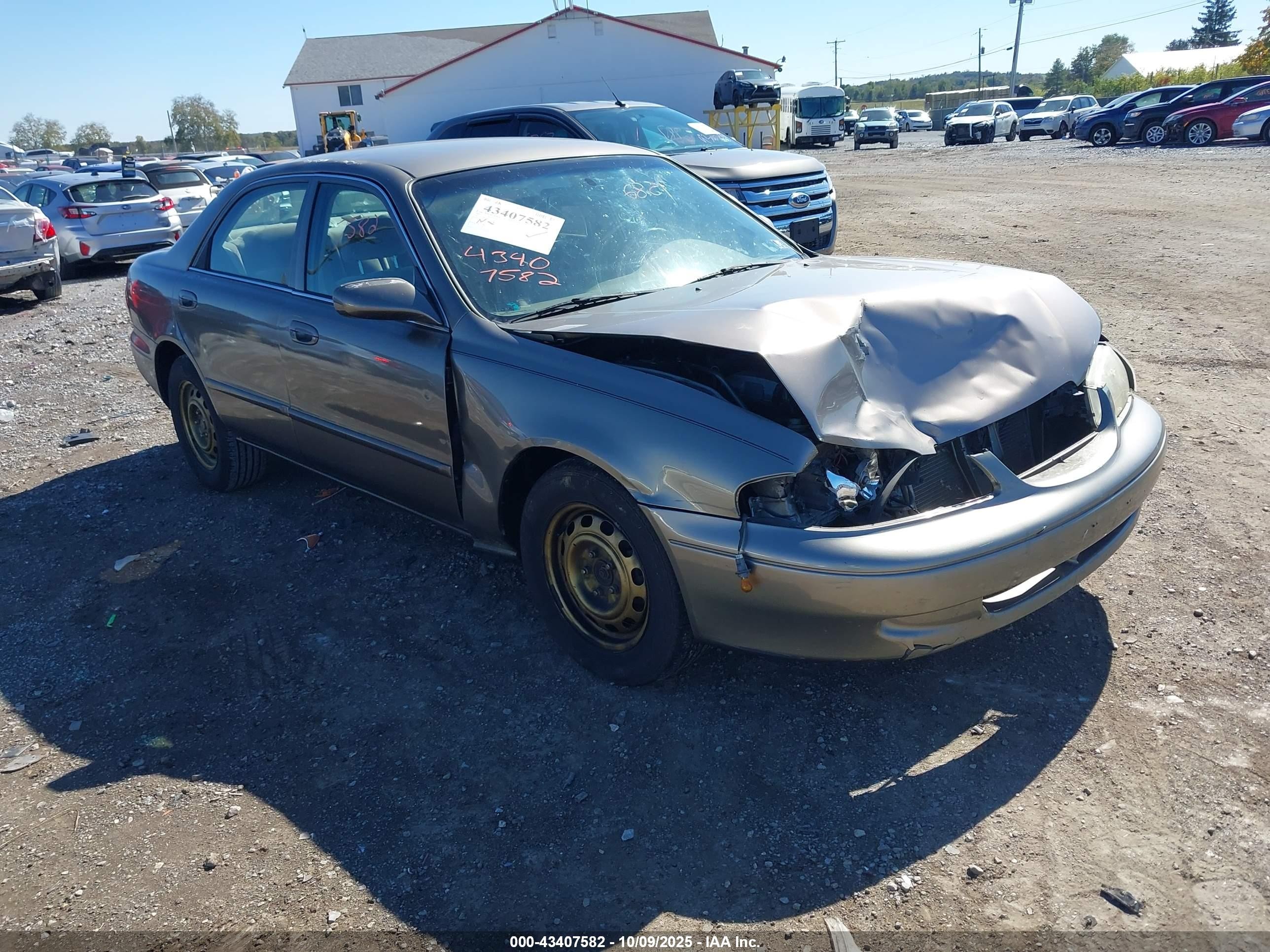 2001 Mazda 626 LX, VIN 1YVGF22C315234647 — Перед