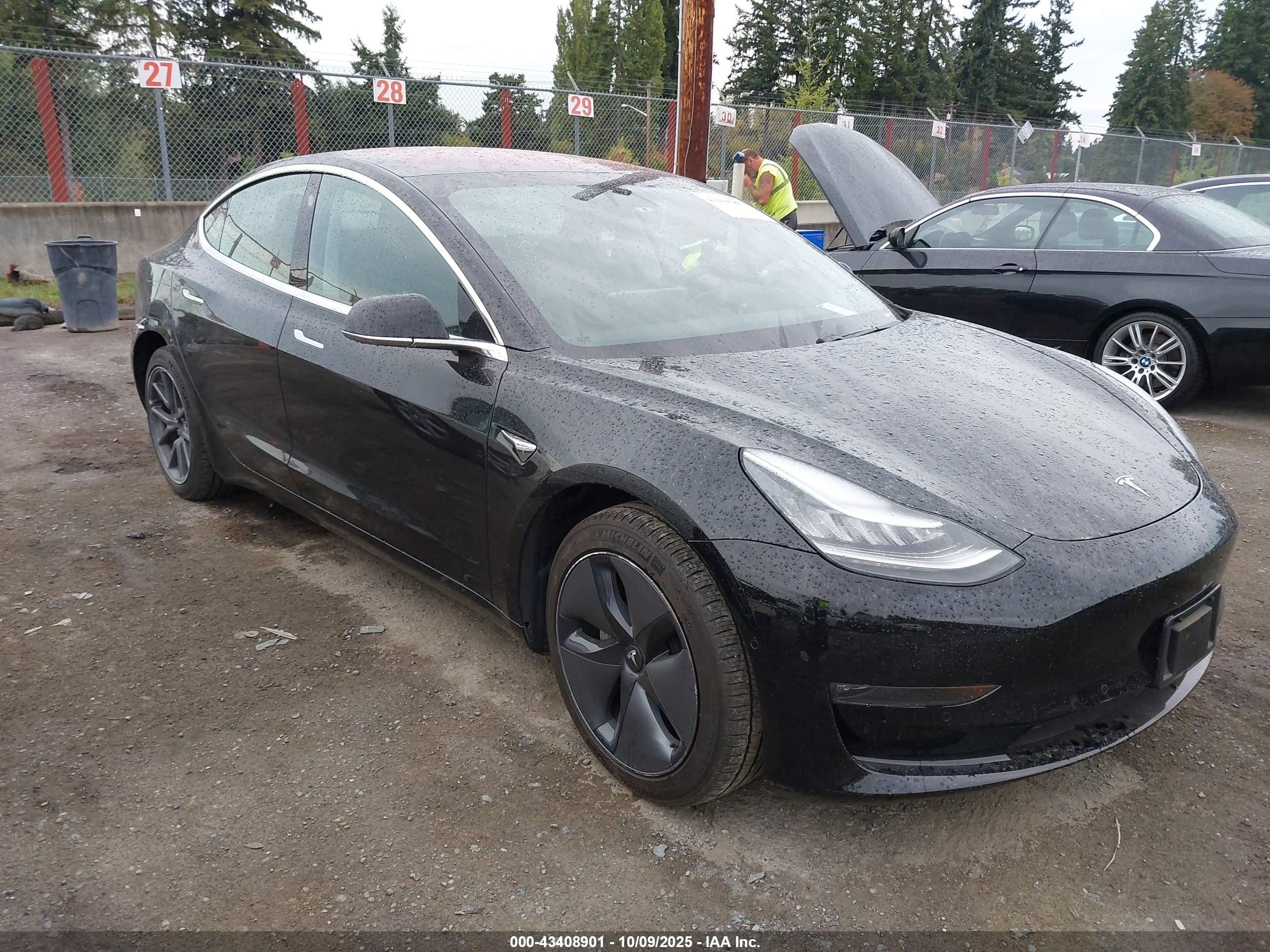 2018 Tesla Model 3 Long Range Battery, VIN 5YJ3E1EA4JF172606 — Rear end