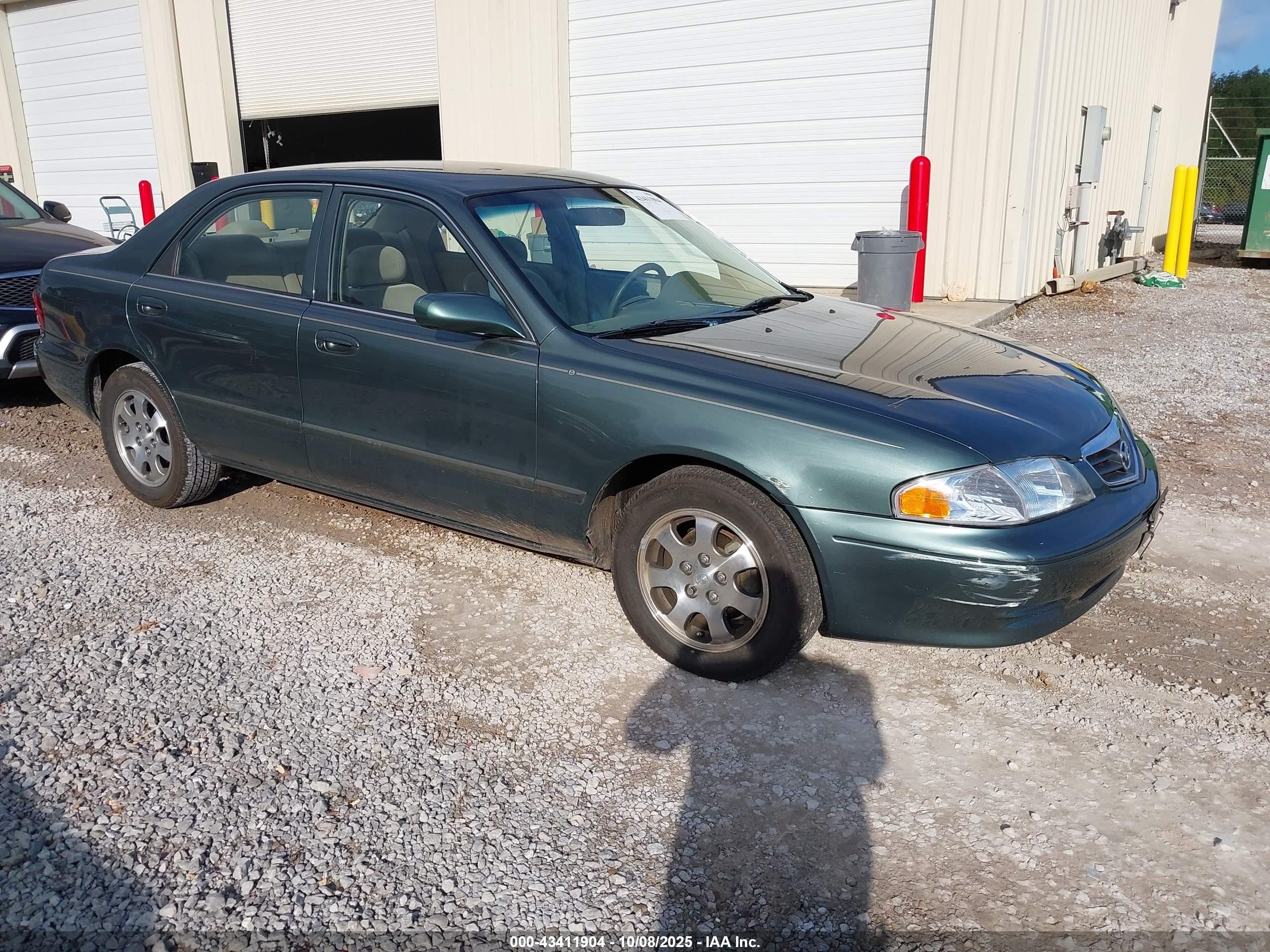 2000 Mazda 626 LX, VIN 1YVGF22C9Y5136300 — Side