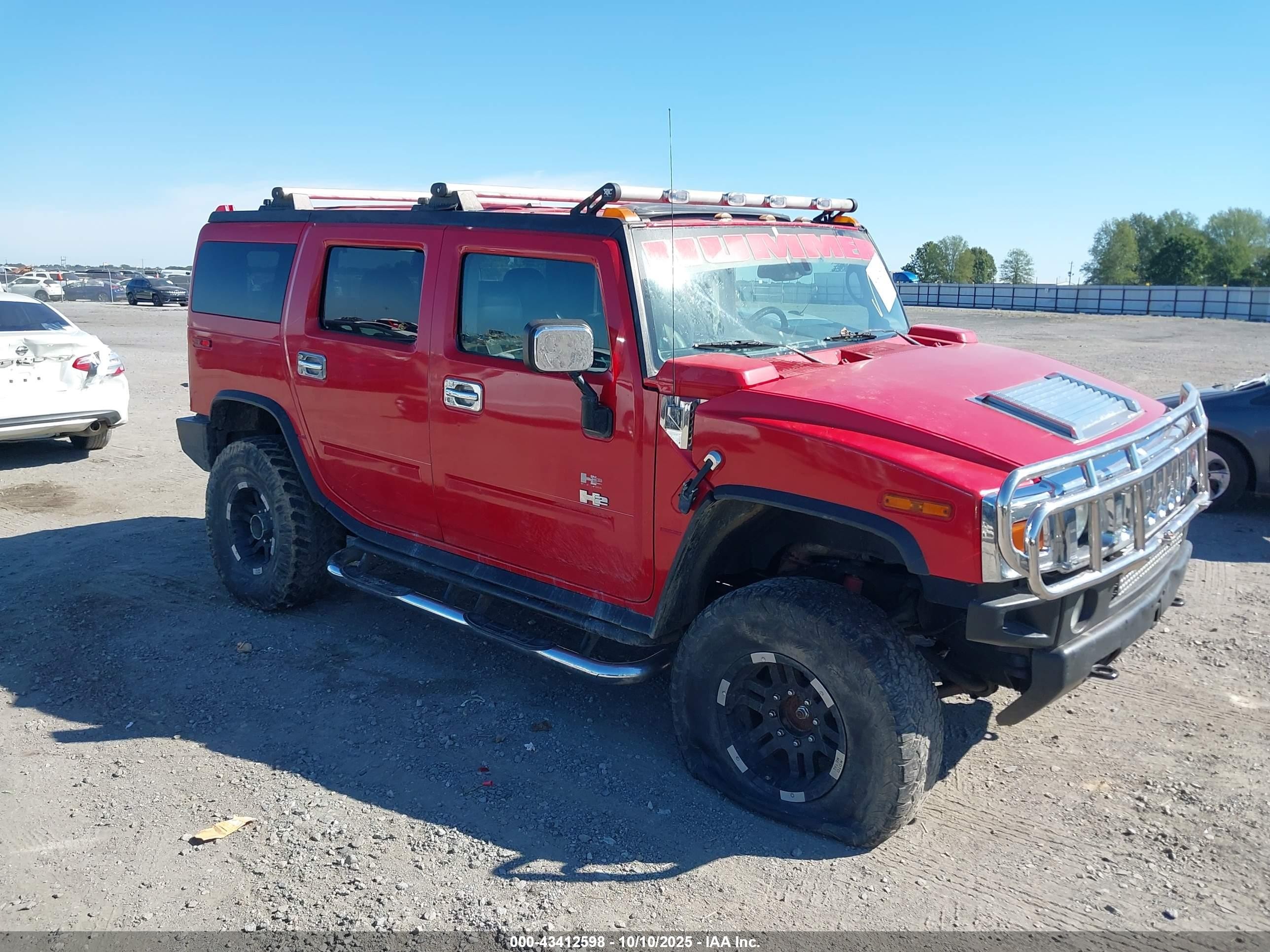 2004 Hummer H2, VIN 5GRGN23U94H116295 — Undercarriage