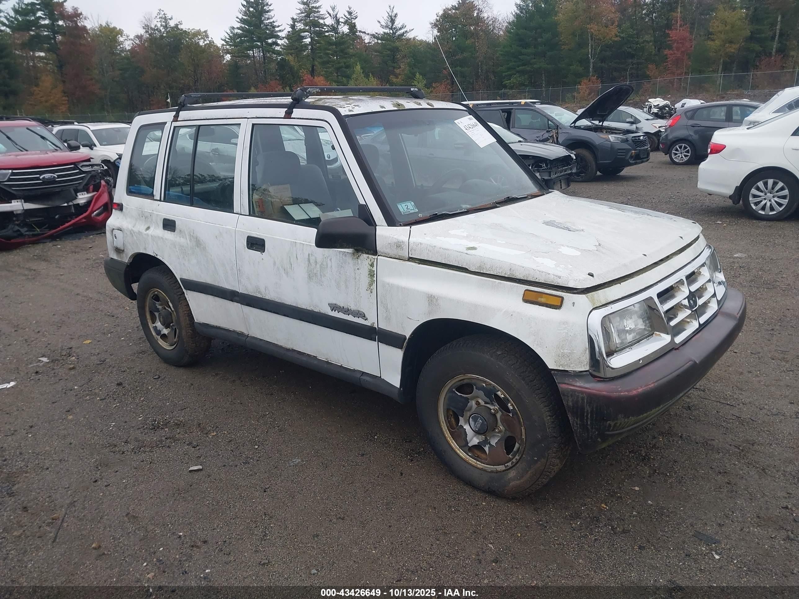 1998 Chevrolet Tracker, VIN 2CNBJ1366W6916401 — Undercarriage