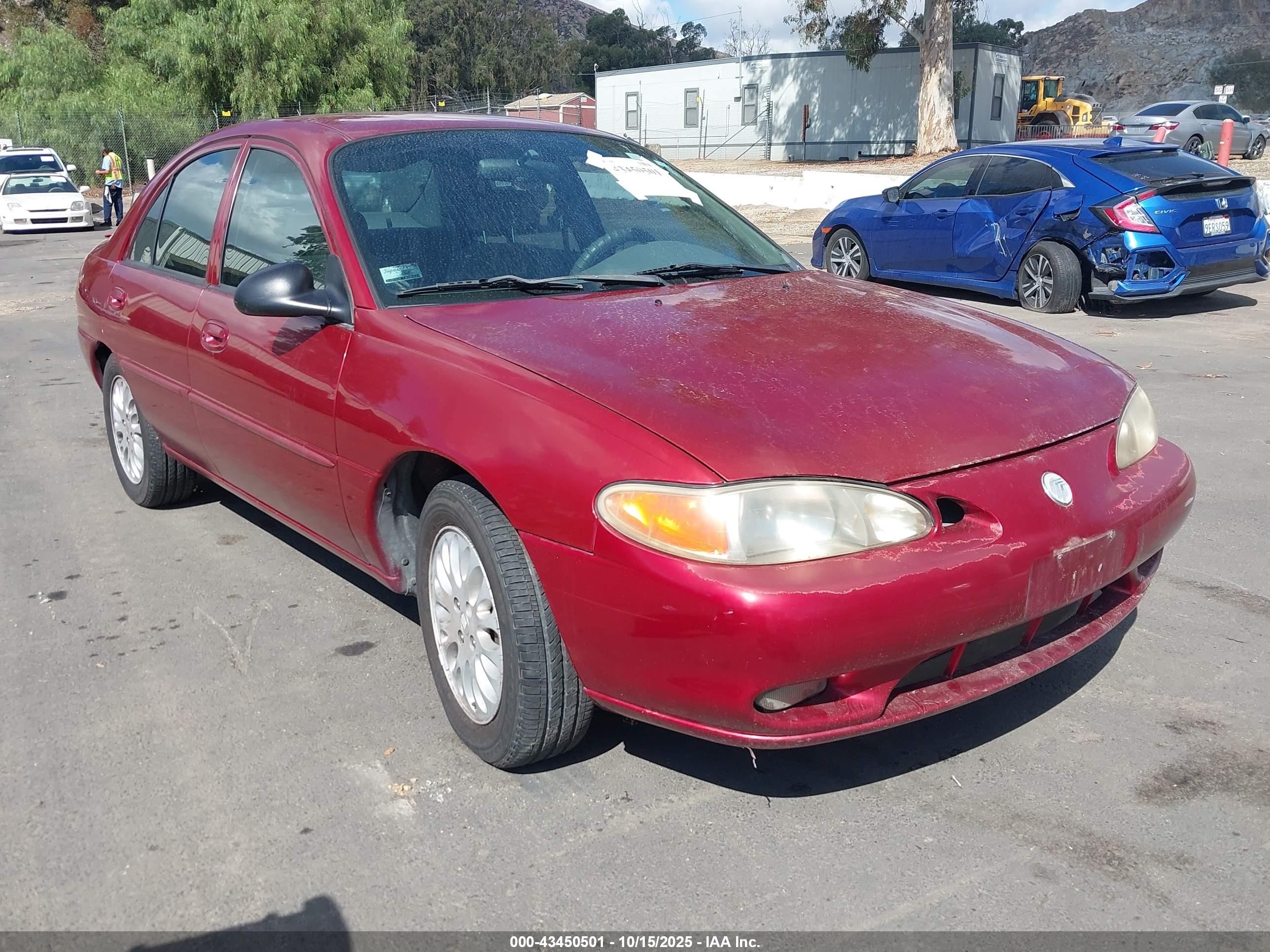 1999 Mercury Tracer LS, VIN 1MEFM13P9XW621255 — Обычный износ