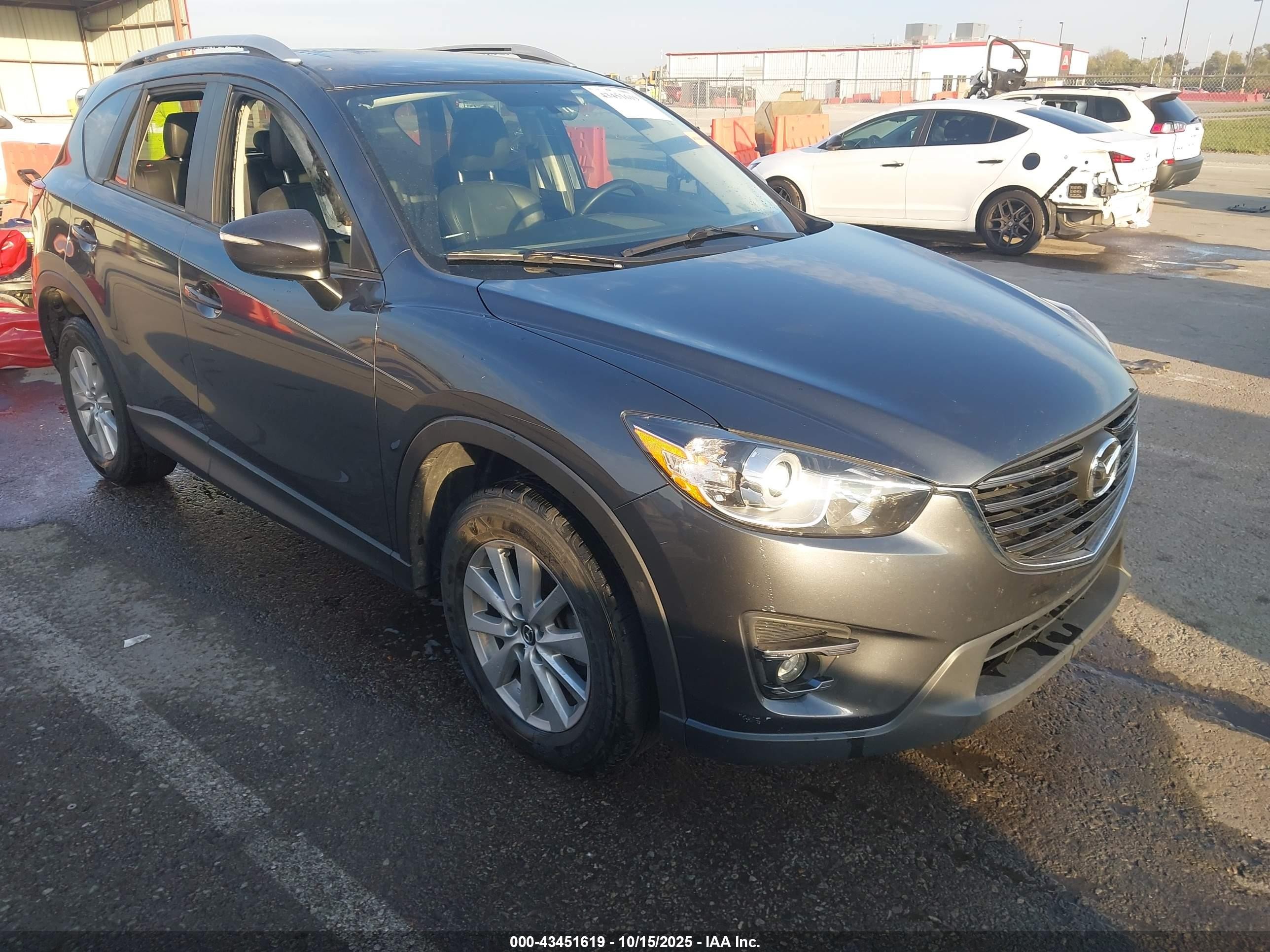 2016 Mazda CX-5 Touring, VIN JM3KE4CY5G0823253 — Interior fire