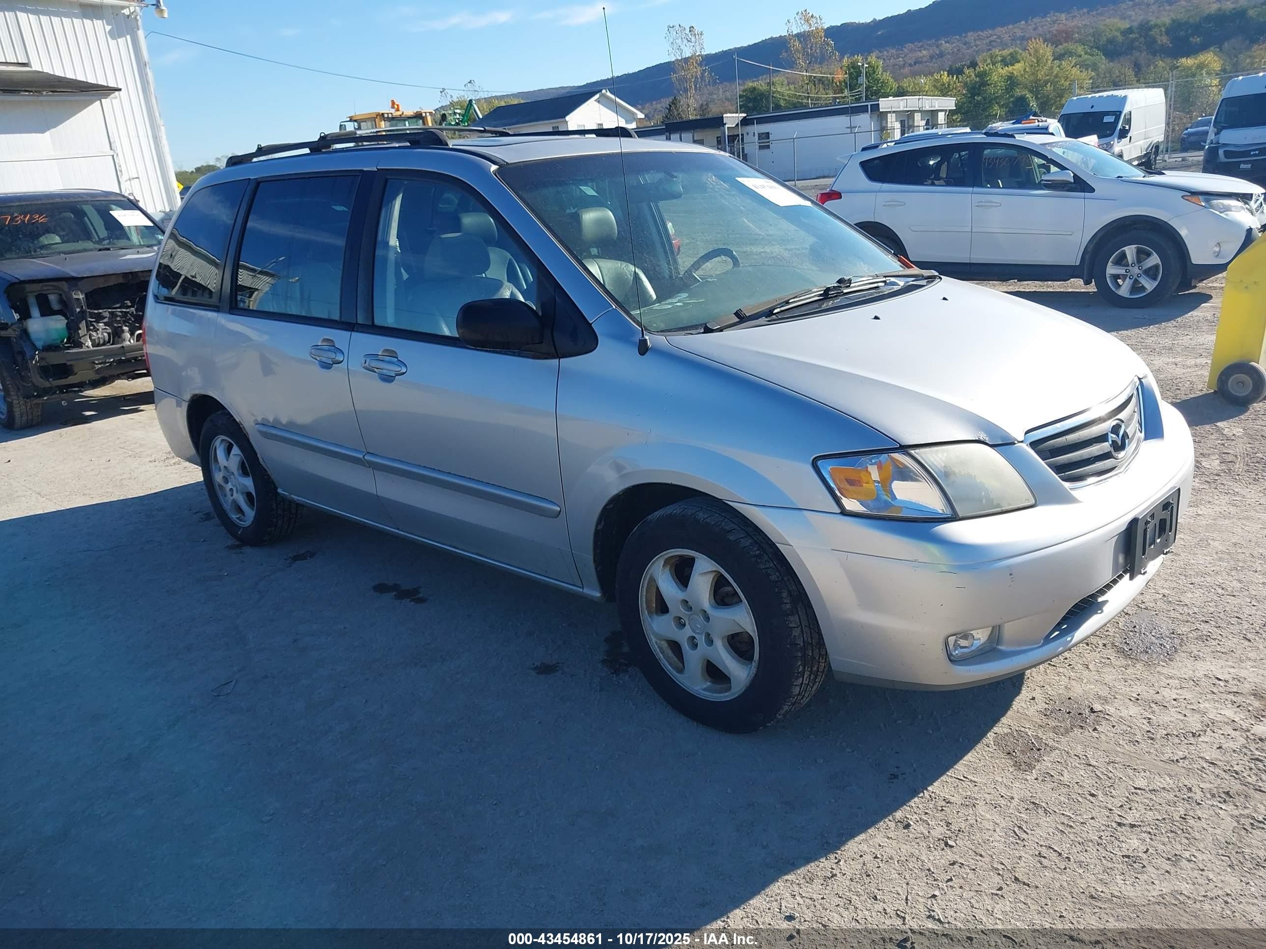 2001 Mazda MPV DX, VIN JM3LW28Y810198255 — Side