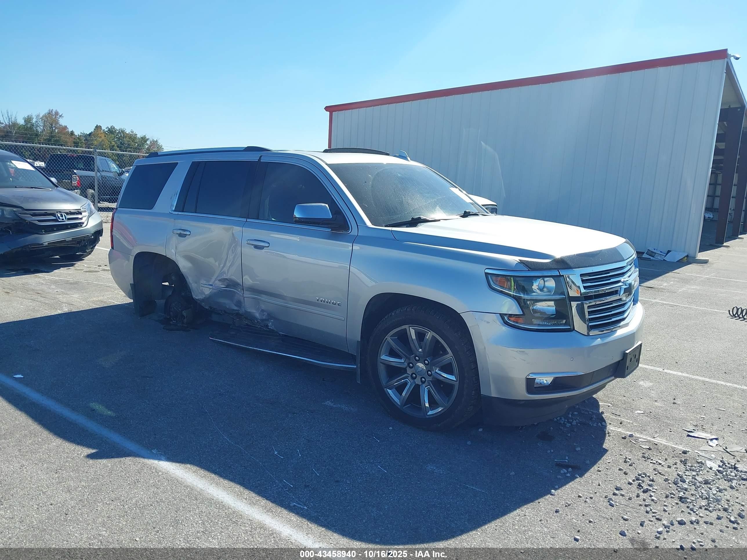 2017 Chevrolet Tahoe Premier, VIN 1GNSKCKC9HR377758 — Side